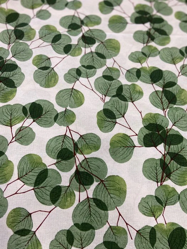 Fabric with eucalyptus leaves in double-height pile