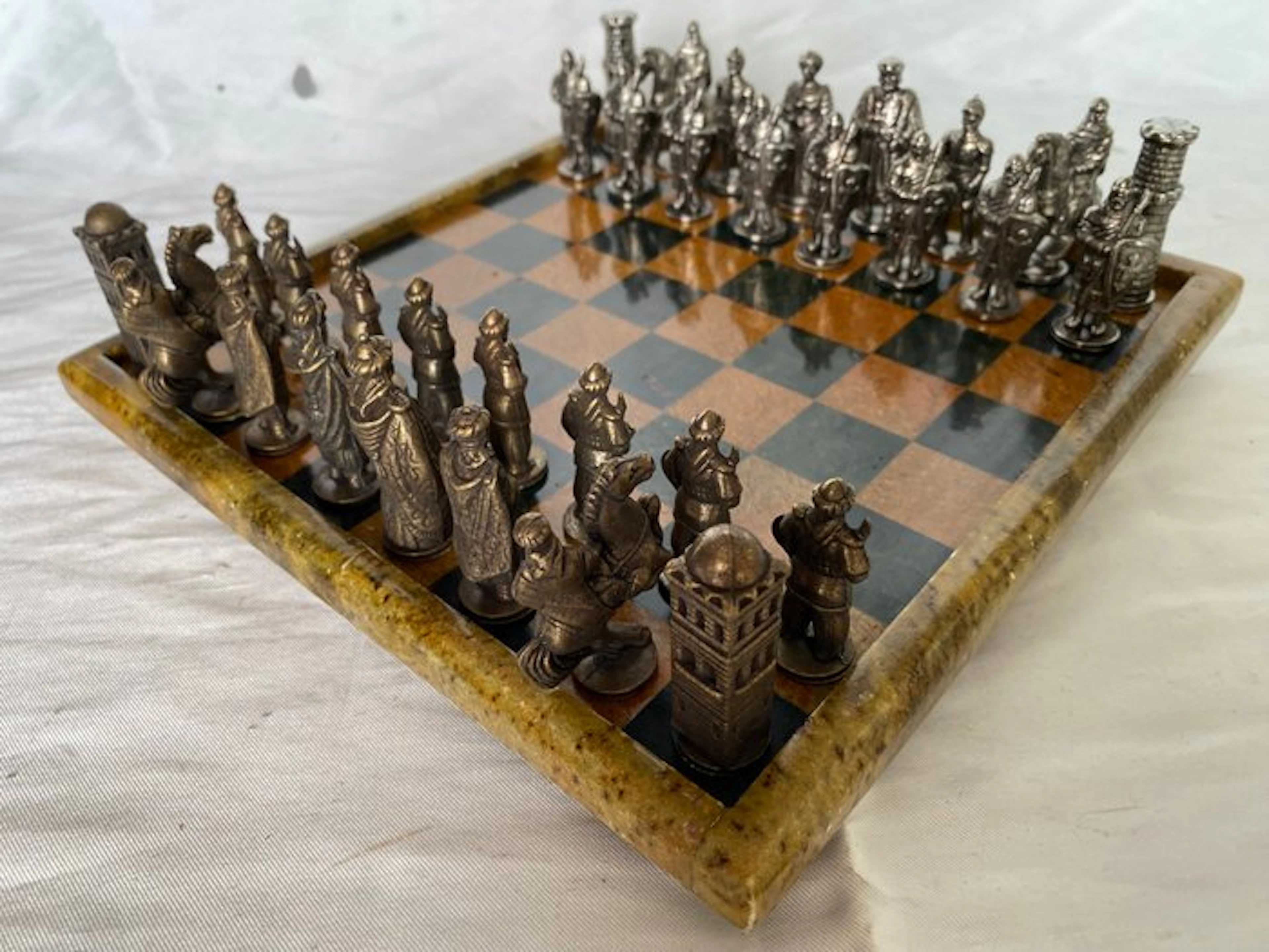 Chess set - marble board and figures, crafted in bronze, in relief
