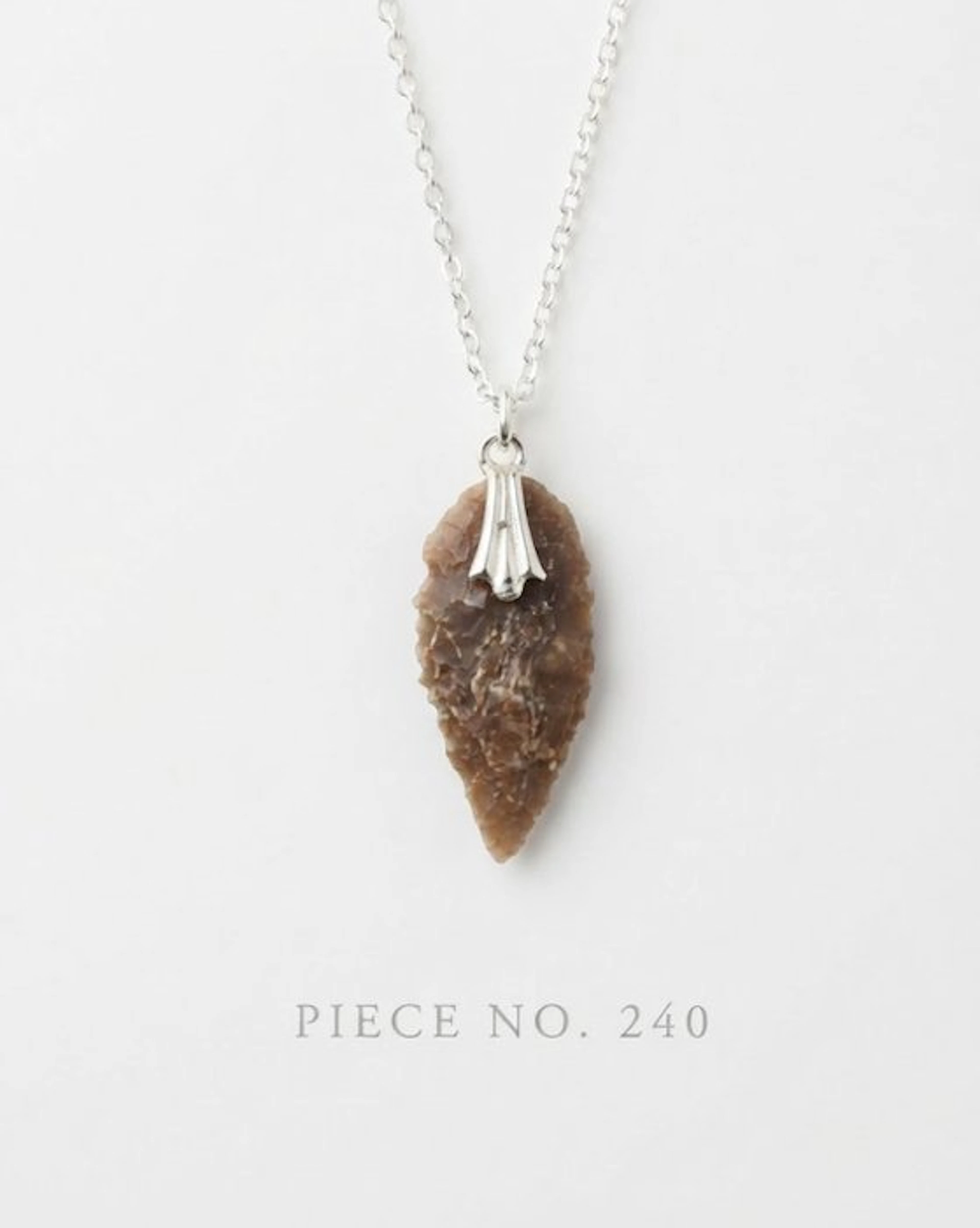 Musterian Silex arrowhead. With silver chain.