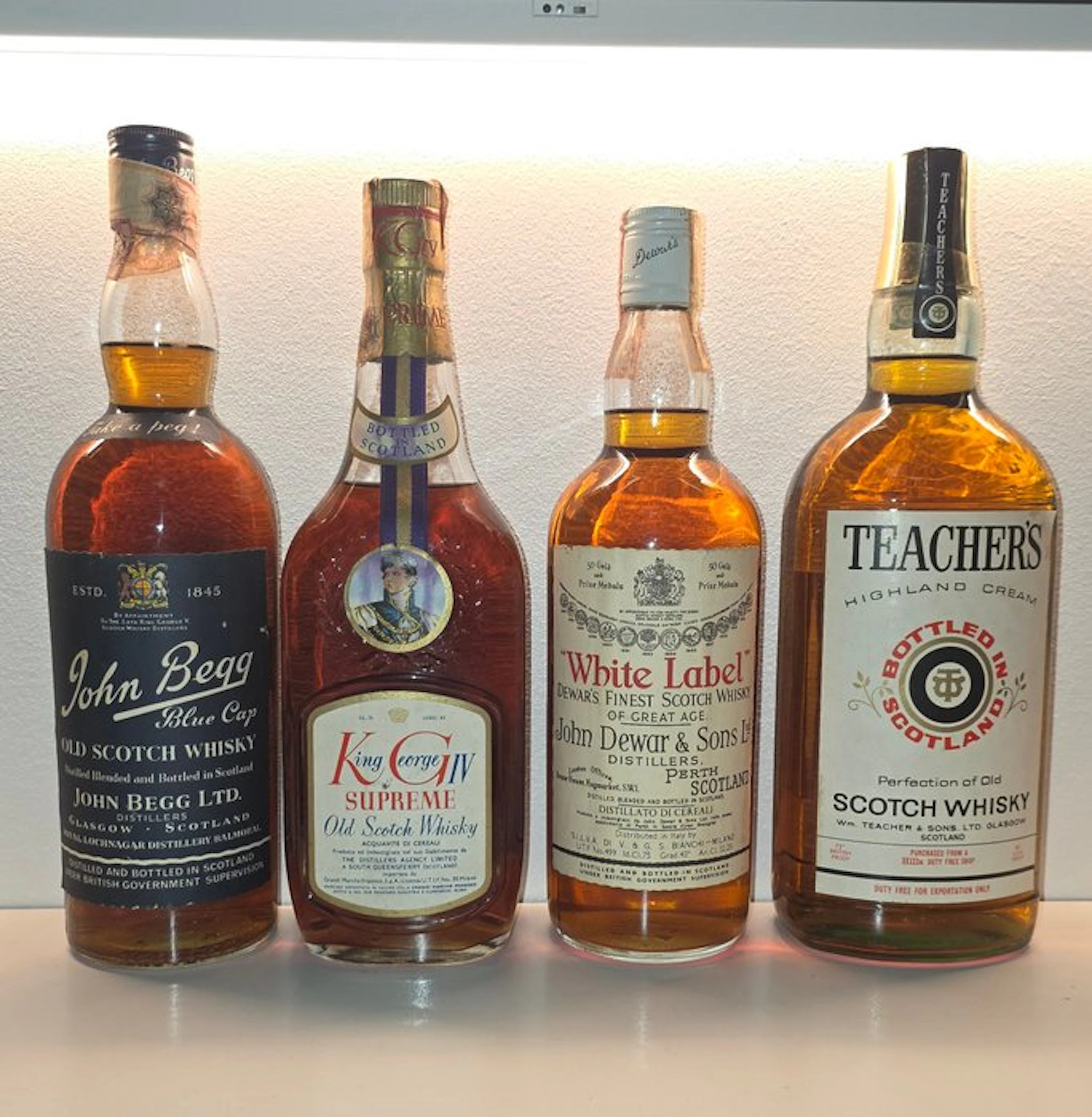 John Begg + King George IV + Dewar's White Label + Teacher's Highland Cream - b