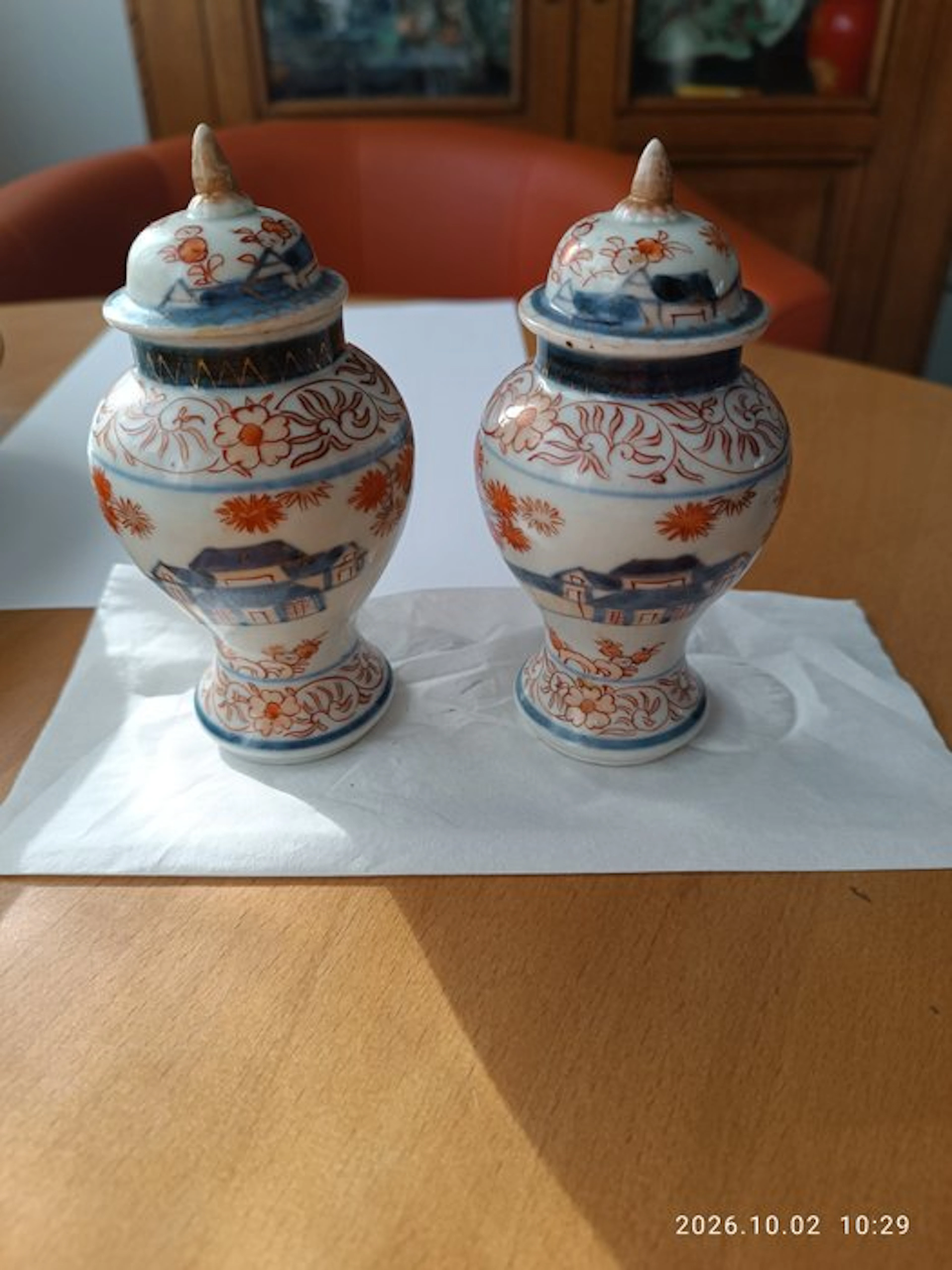 Pair of small covered pots
