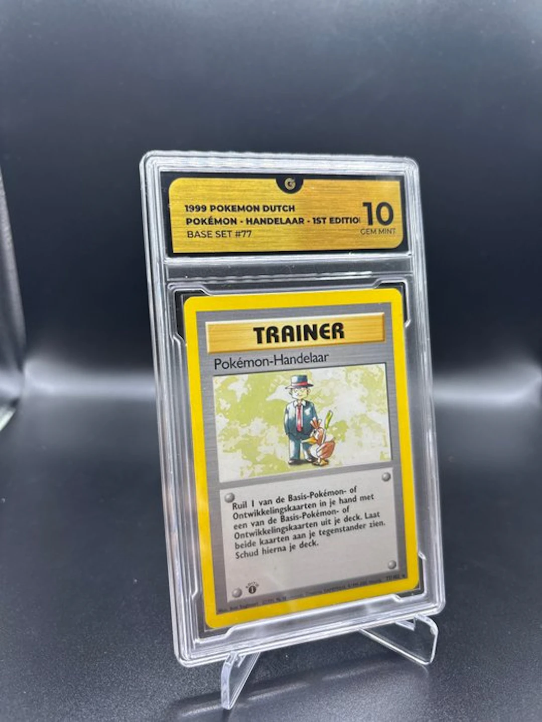 Pokémon - 1 Graded card - Pokémon-Handelaar 77 First edition - GG 10 - WOTC