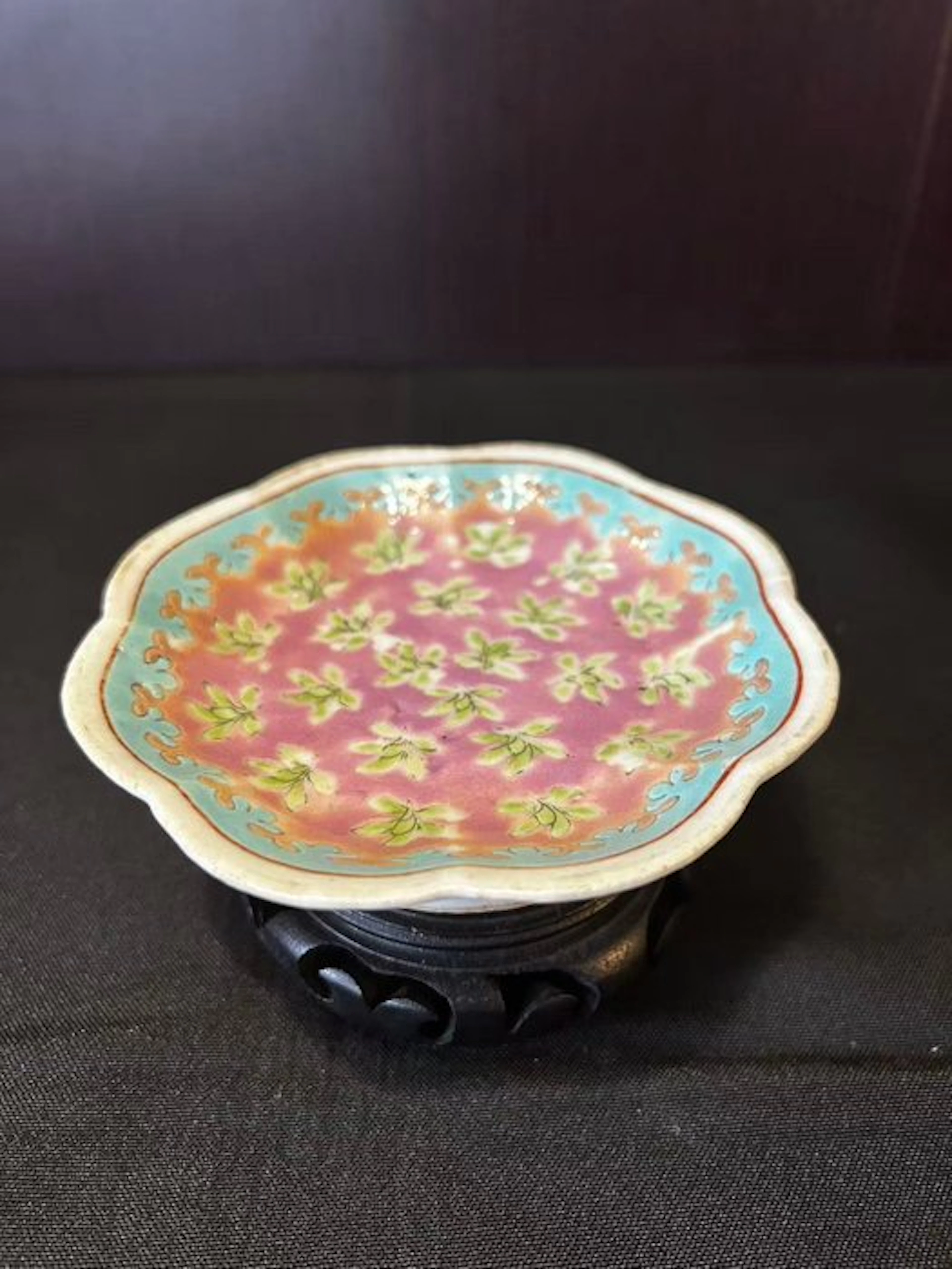 Small porcelain dish with polychrome floral decoration