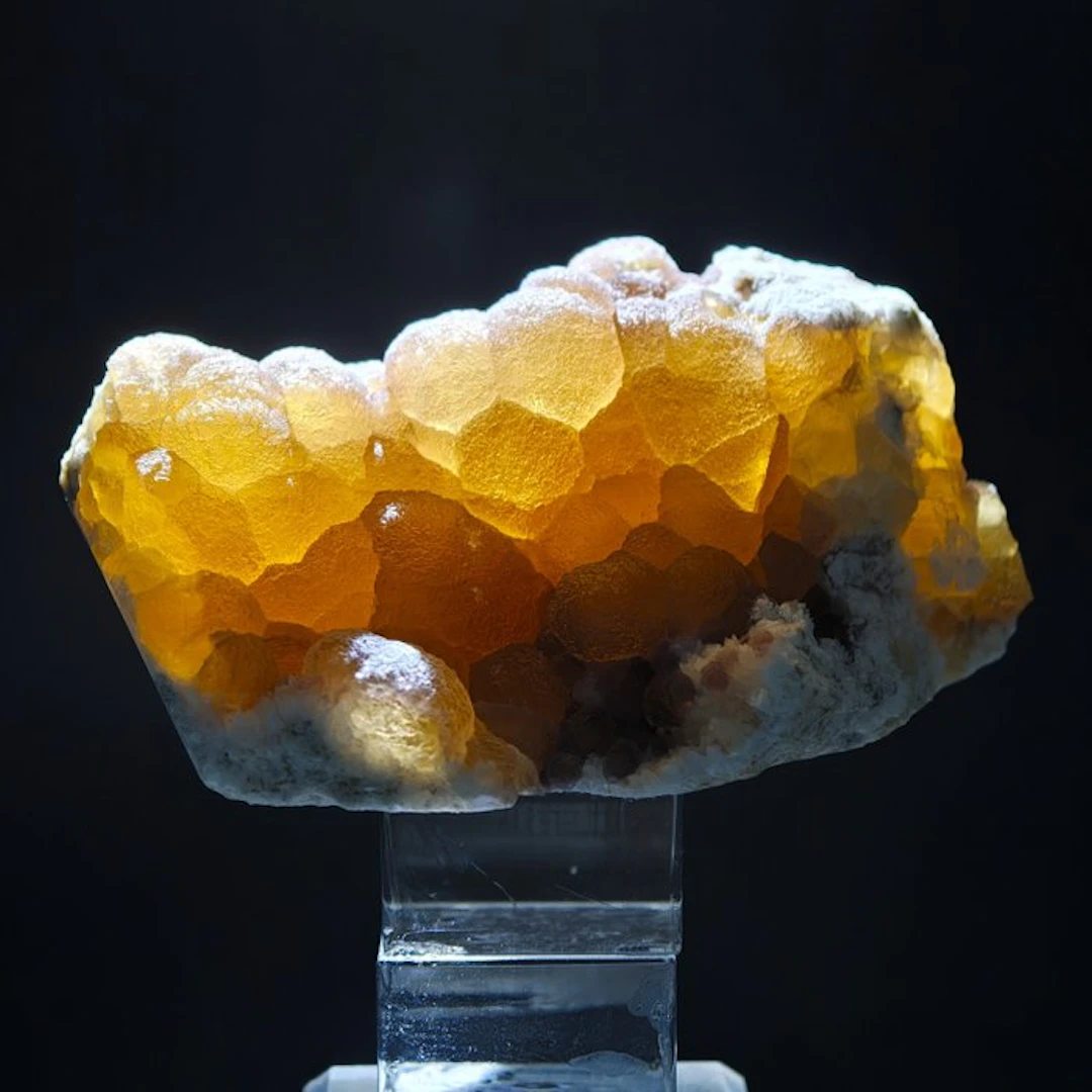 Yellow spherical fluorite on quartz