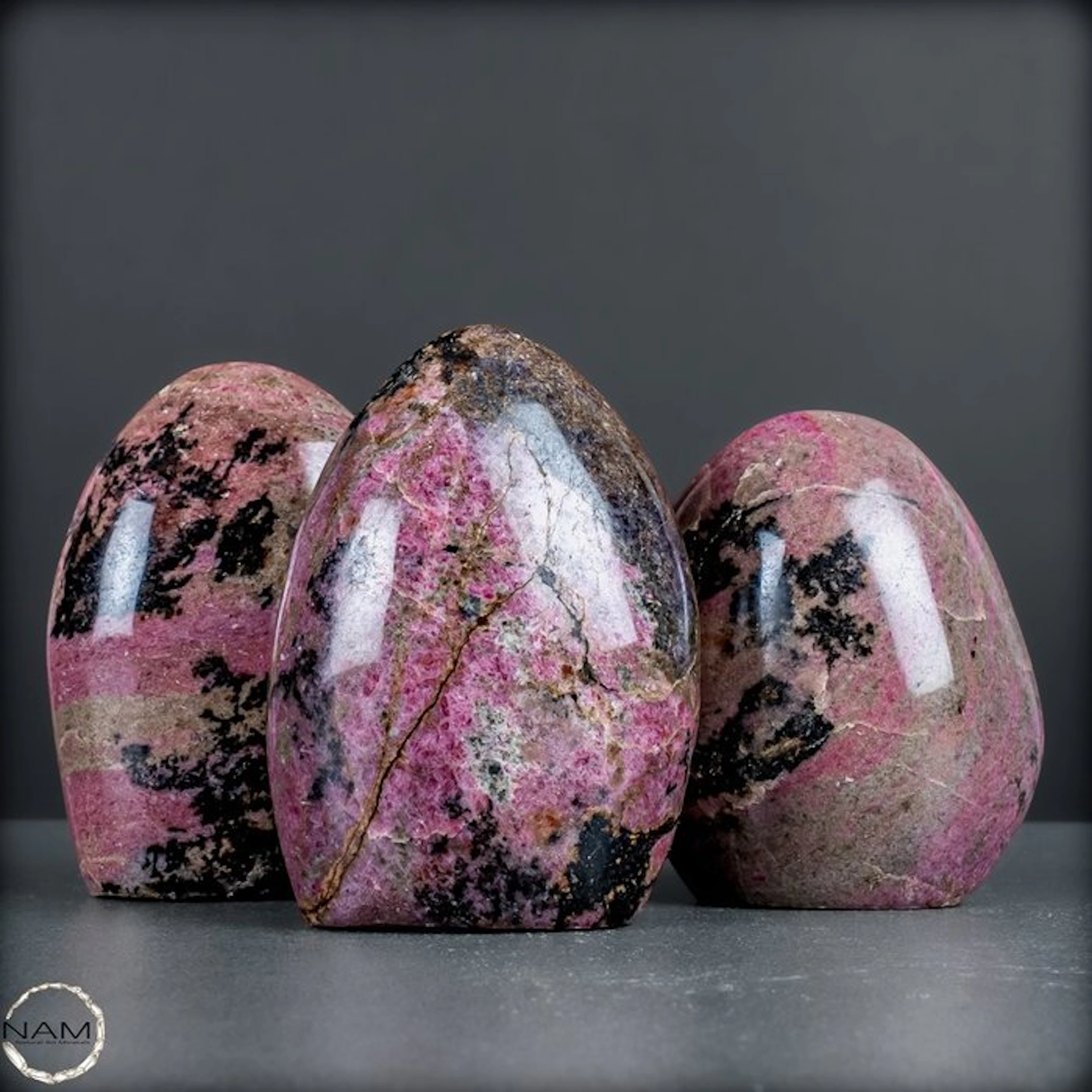 Rhodonit Trio – Three unique freeform shapes full of...