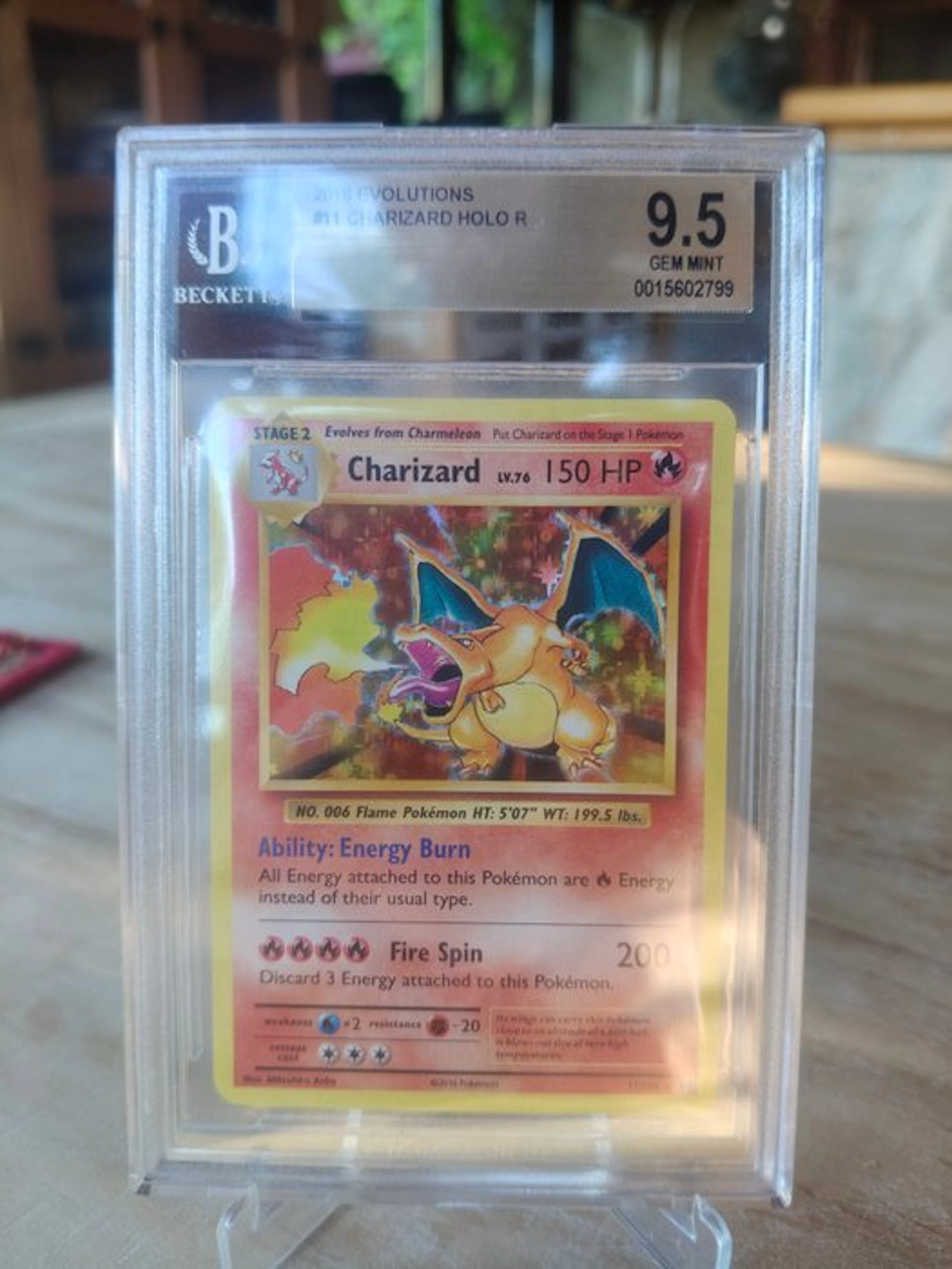 Pokémon - 1 Graded card - Charizard 11/108 Foil