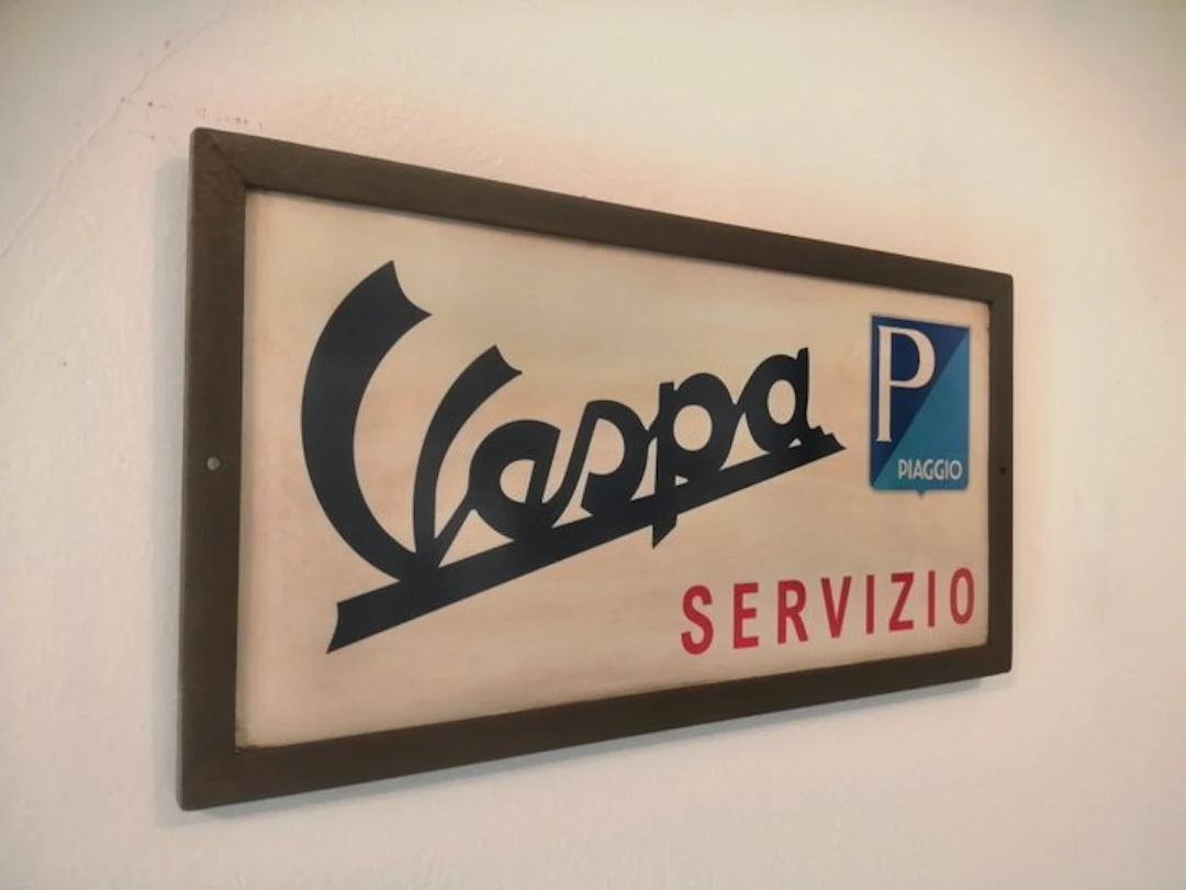 Piaggio - Vespa advertising sign service - Piaggio - Advertising sign - Metal