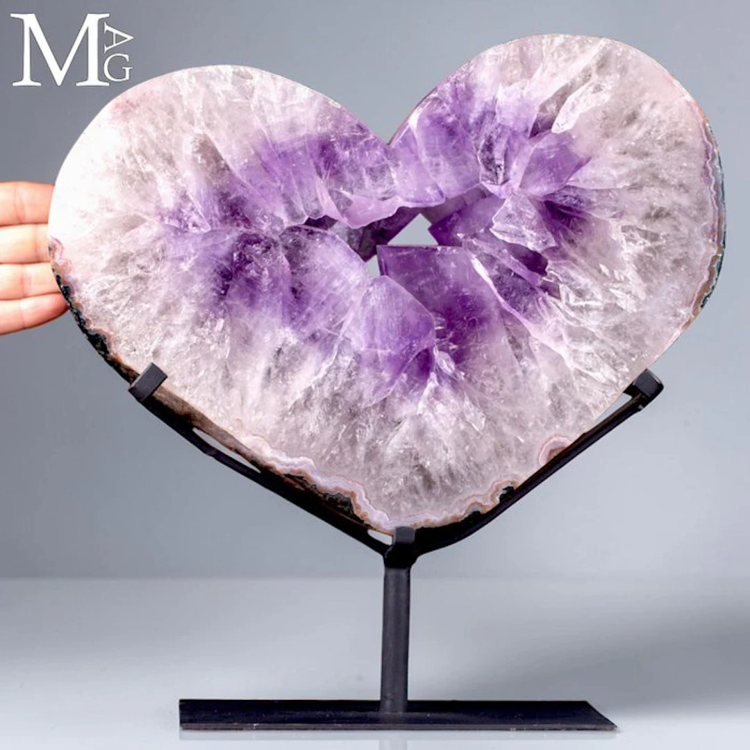 Large slice of Brazilian amethyst geode with a deep purple crystal cavity