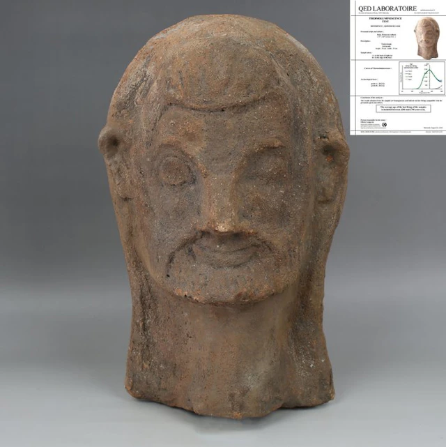 Etruscan Pottery Anatomical votive model of a head with...
