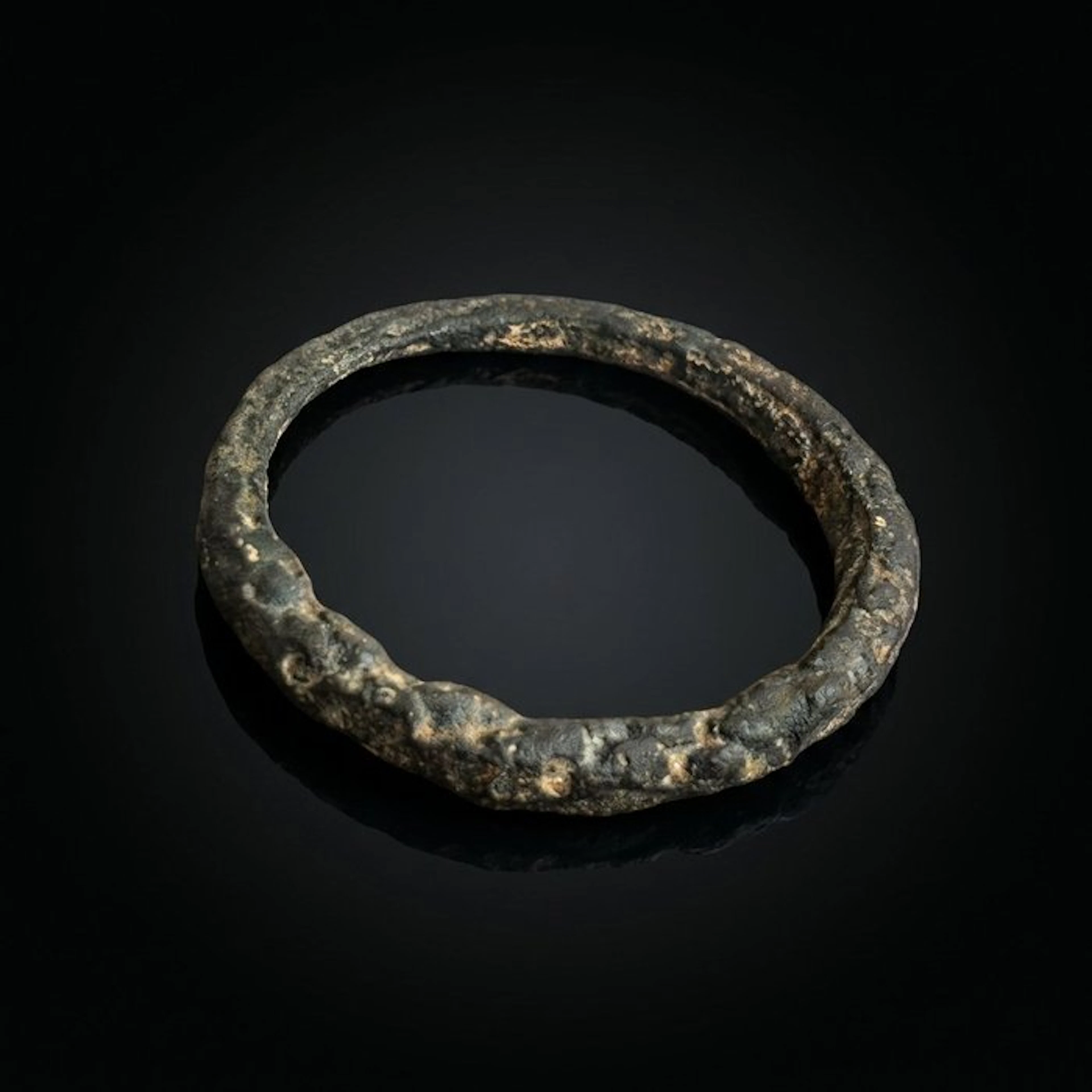 Viking Era Bronze Twisted Ring with Unusual Shank Profile...