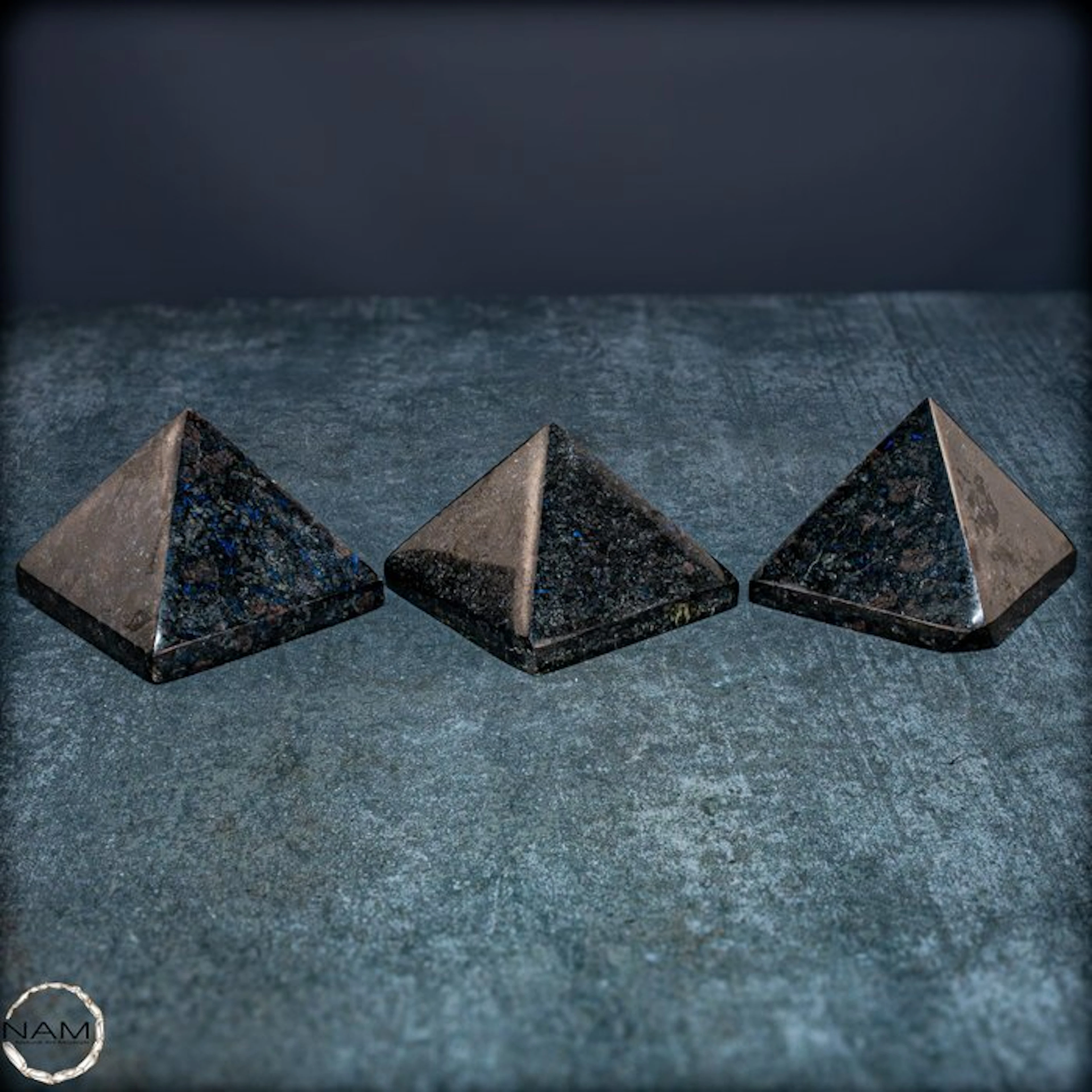 Mystical natural arfvedsonite pyramids with an intense...