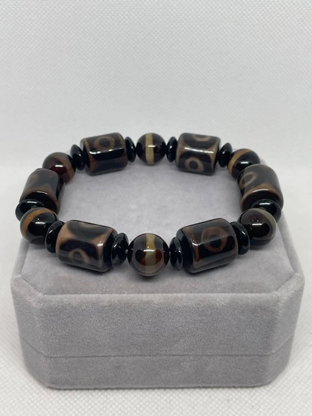 Exclusive Tibetan bracelet with Dzi beads of...