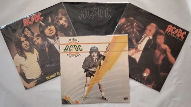 AC/DC, Legendary Australian hard rock band - Four albums...
