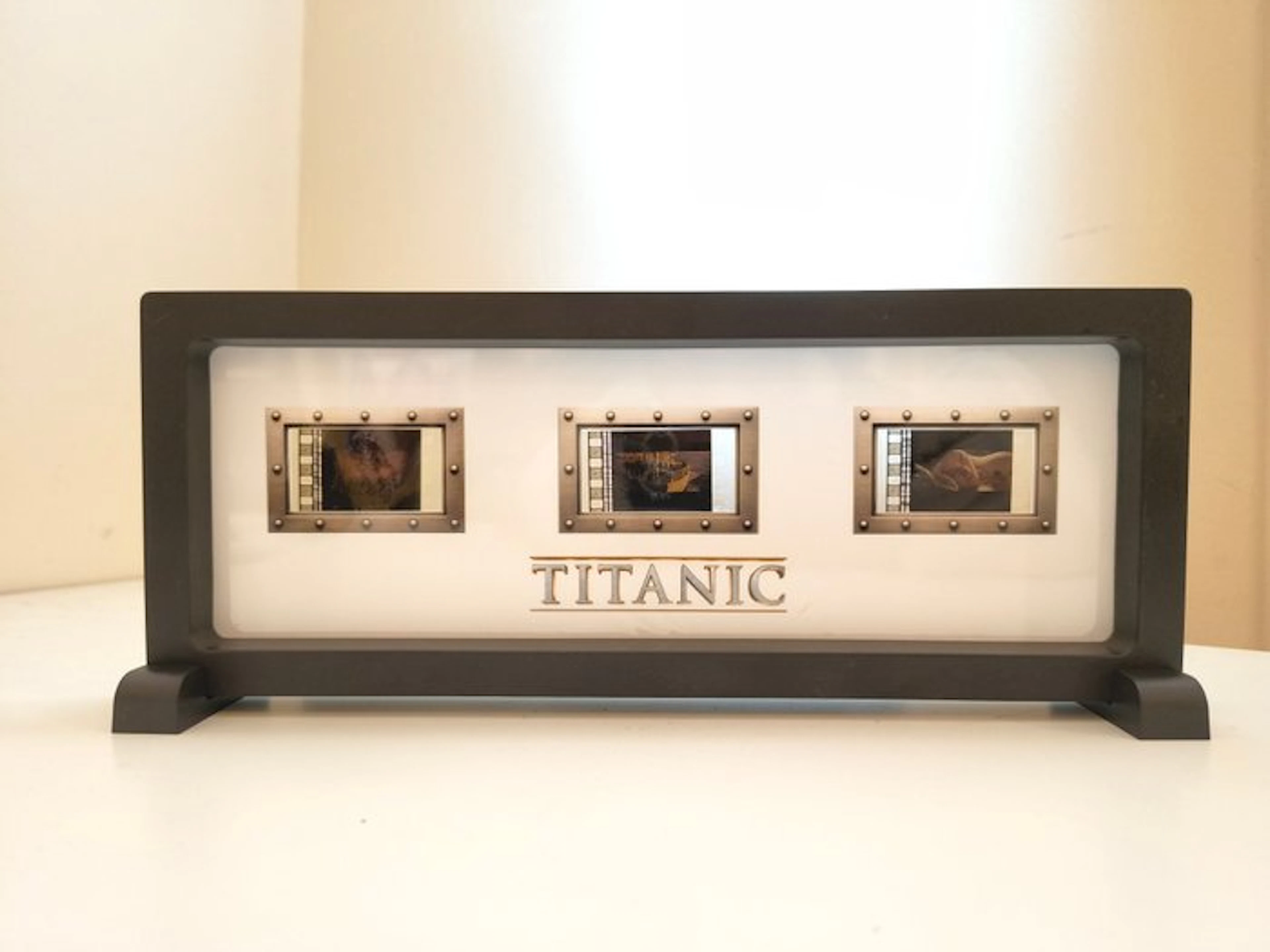 LightBoxFrame frame with 3 Backlit 35 mm film cells from...