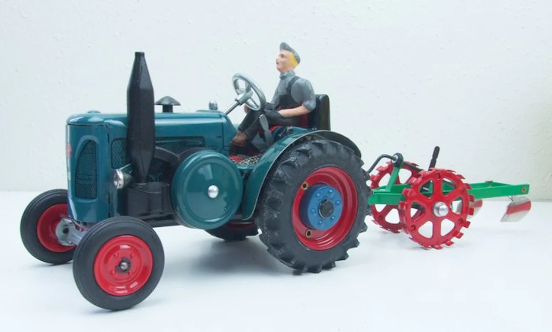 Kovap - Tin wind-up Lanz Bulldog 4016 Tractor and Plough...