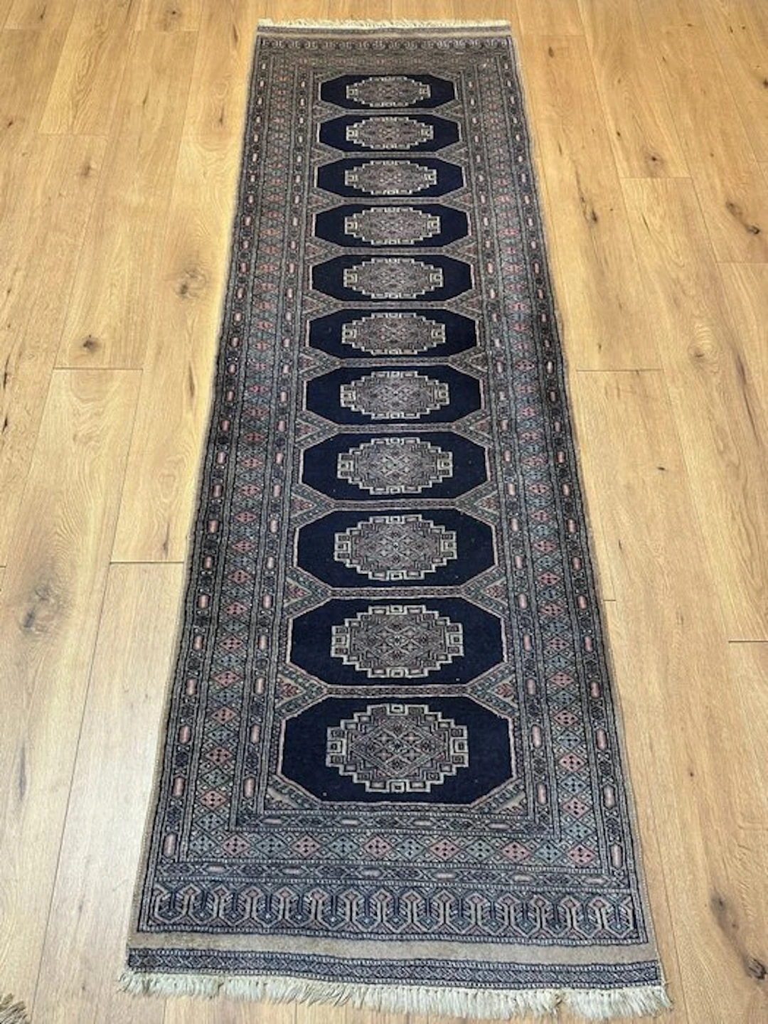 Beautiful Bukhara runner rug with classic gul motifs and a fine border