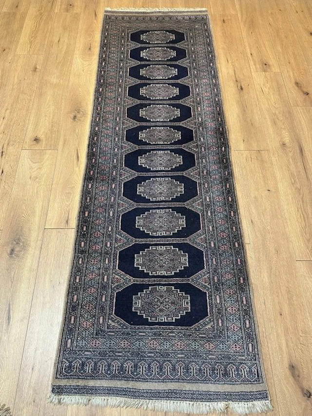 Beautiful Bukhara runner rug with classic gul motifs and a fine border