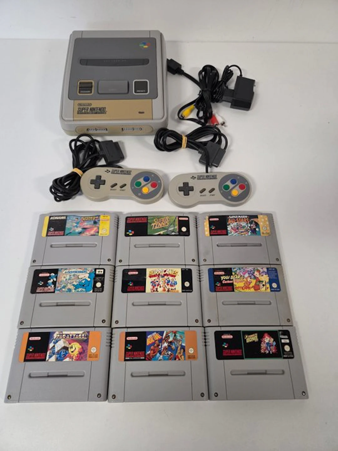 Nintendo - Snes - & 2 Controllers & 9 Game Cartridges...