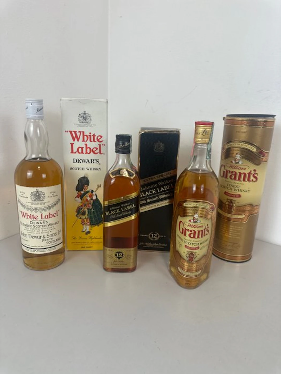 Dewar's + Johnnie Walker + Grant's - b