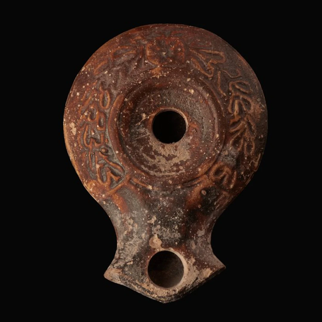 Ancient Roman Terracotta Oil Lamp with Foliate Garland