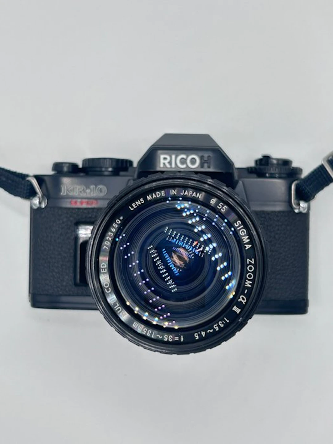 Ricoh KR-10 Super + Sigma Zoom-α III 3.5-4/35-135mm Analogue camera