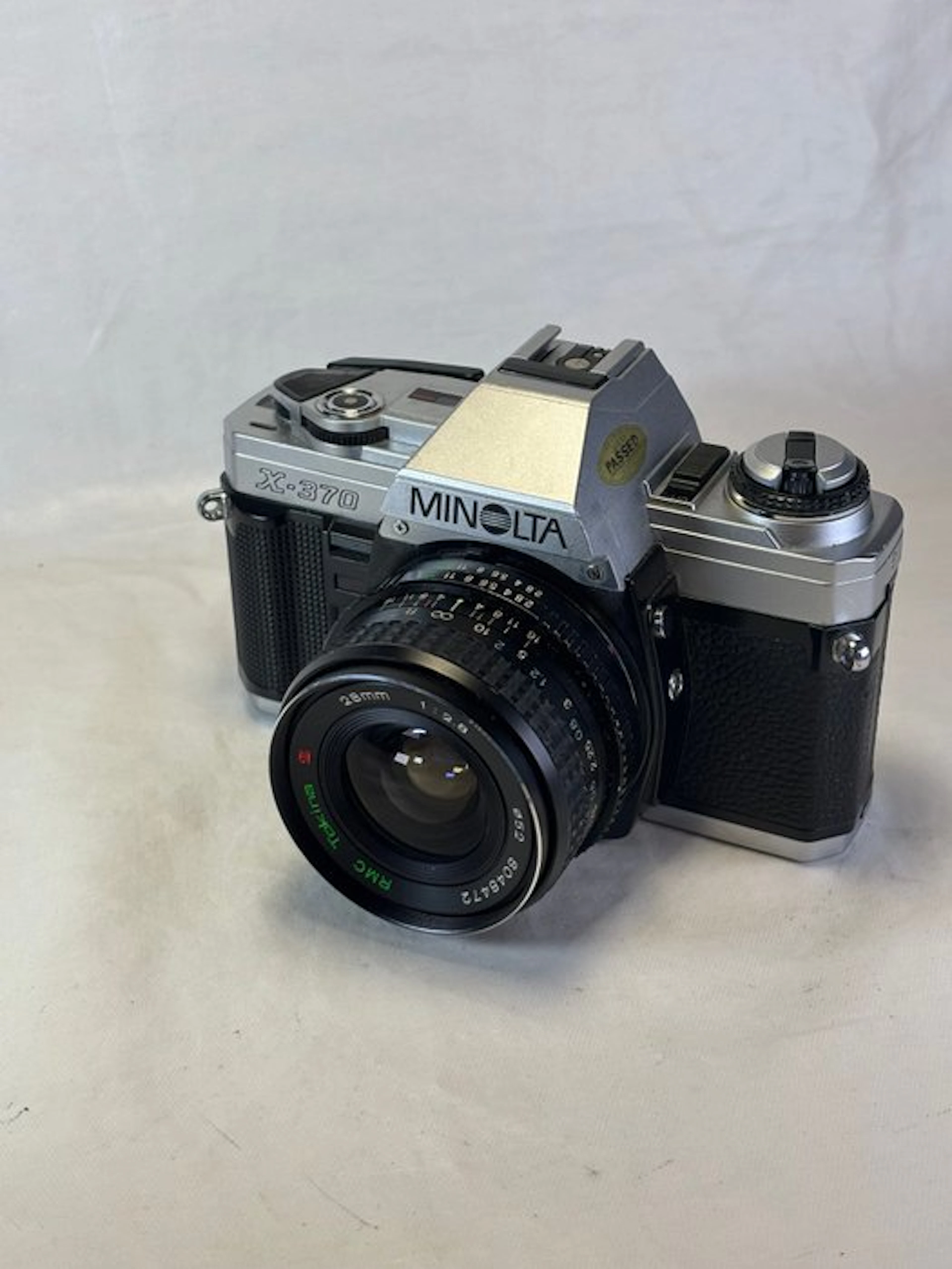 Minolta X-370 + Tokina 2.8/28mm | Single lens reflex camera (SLR)