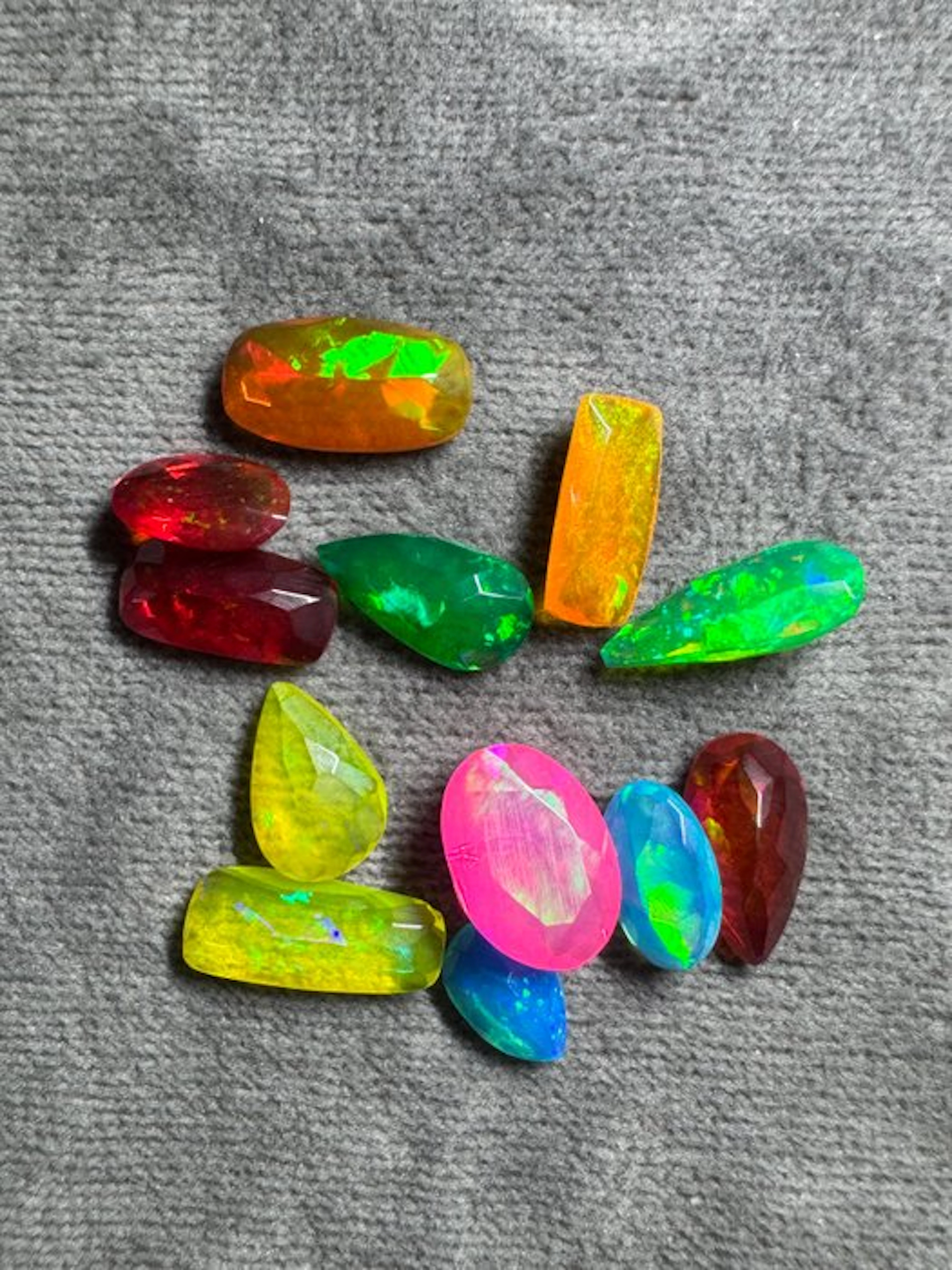 10-carat lot of Ethiopian multicolored faceted opals...