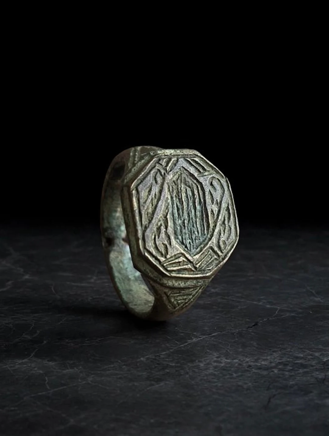 Islamic Bronze Ring with Engraved Octagonal Bezel 15th Century AD