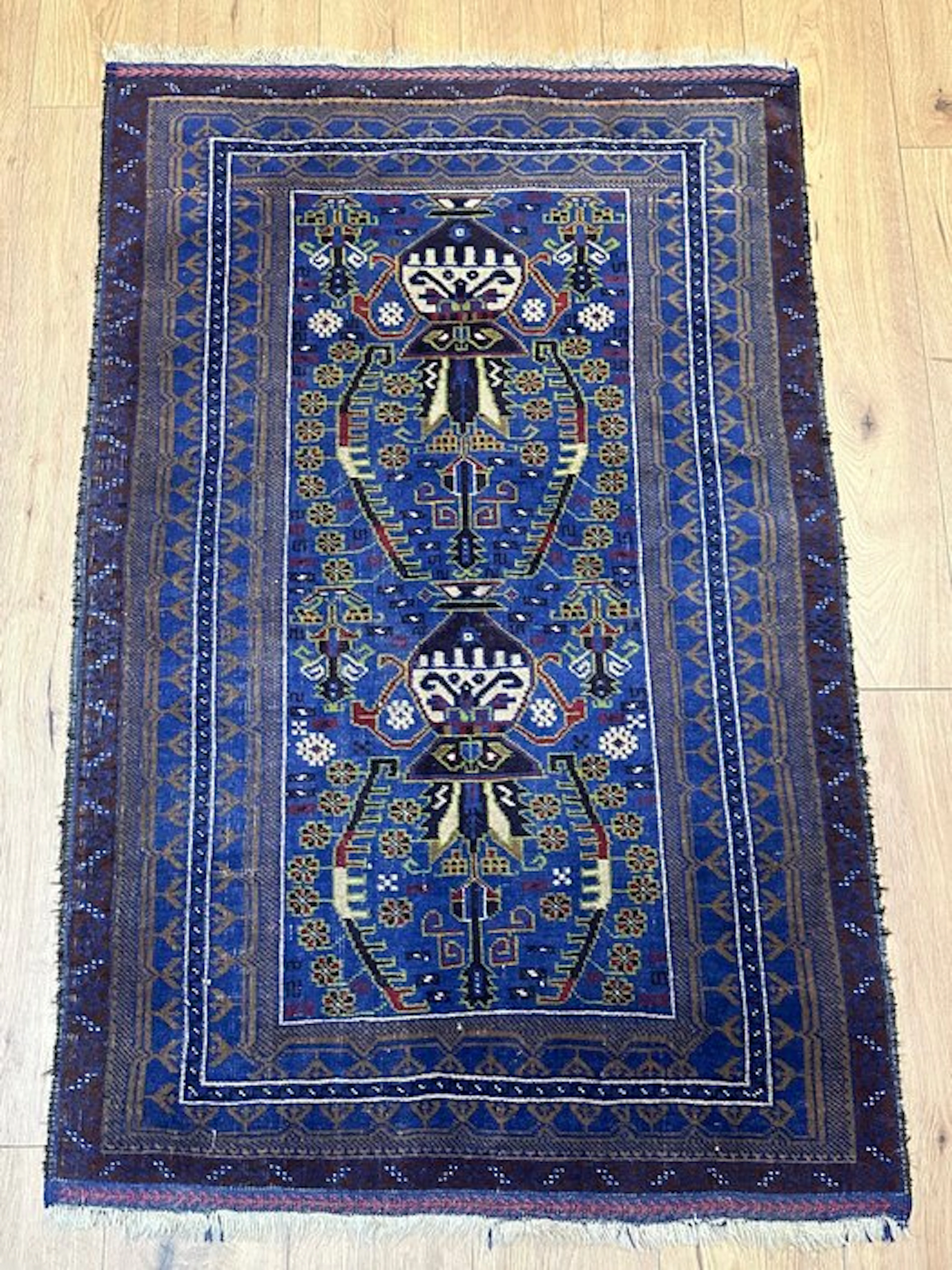 Hand-knotted Oriental rug in the traditional...