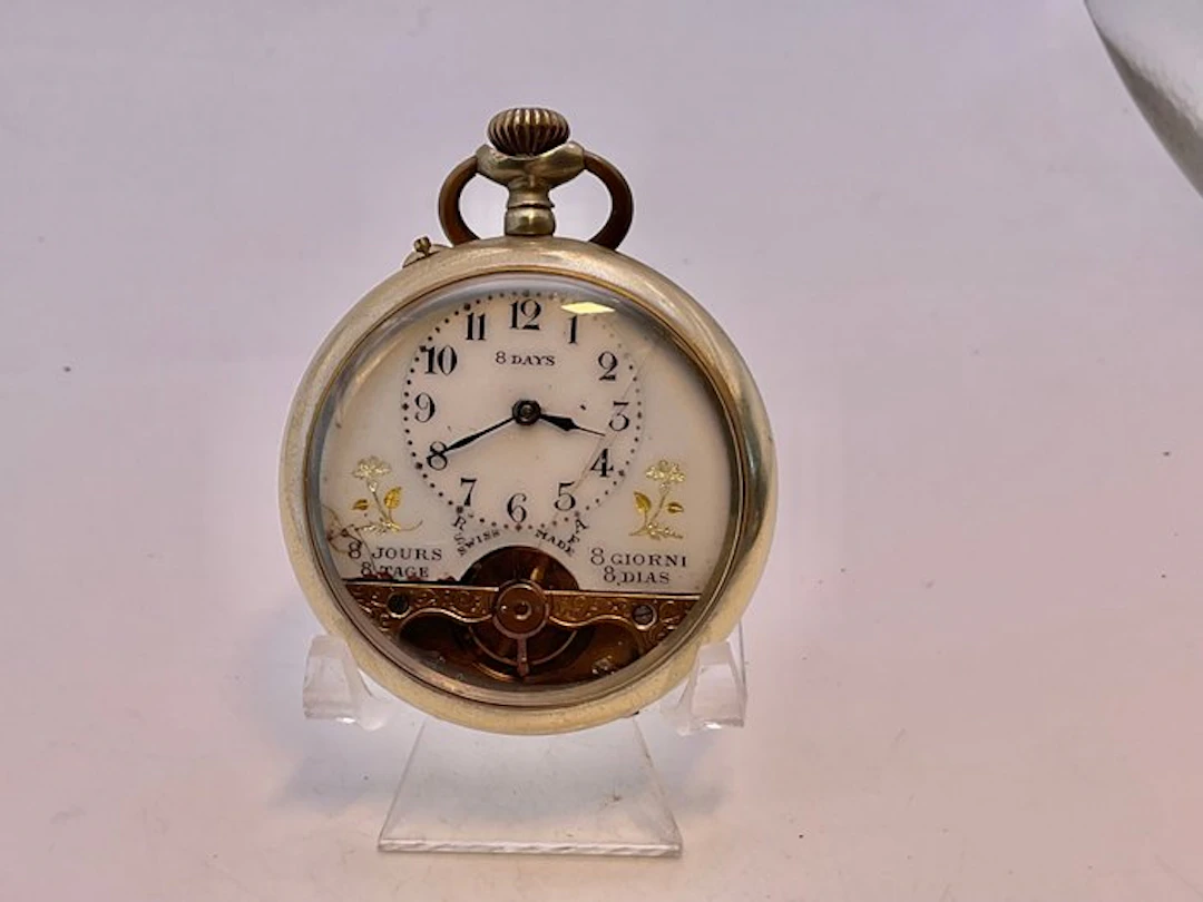 8 Giorni . Metallo . Quadrante decorato . 1920 . - 1900-1949