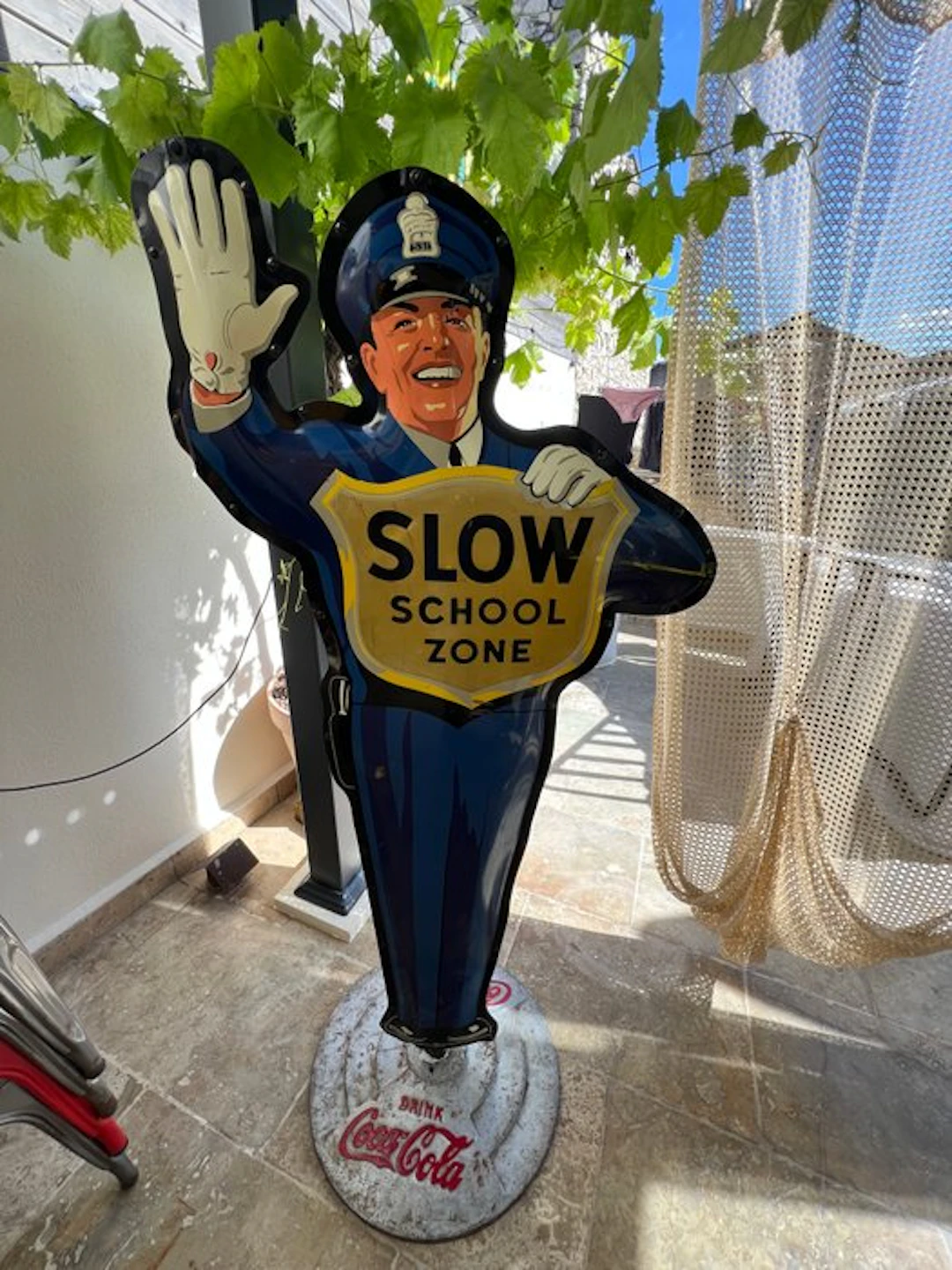 Coca-Cola - Slow School Zone Coca-Cola sign policeman - Advertising