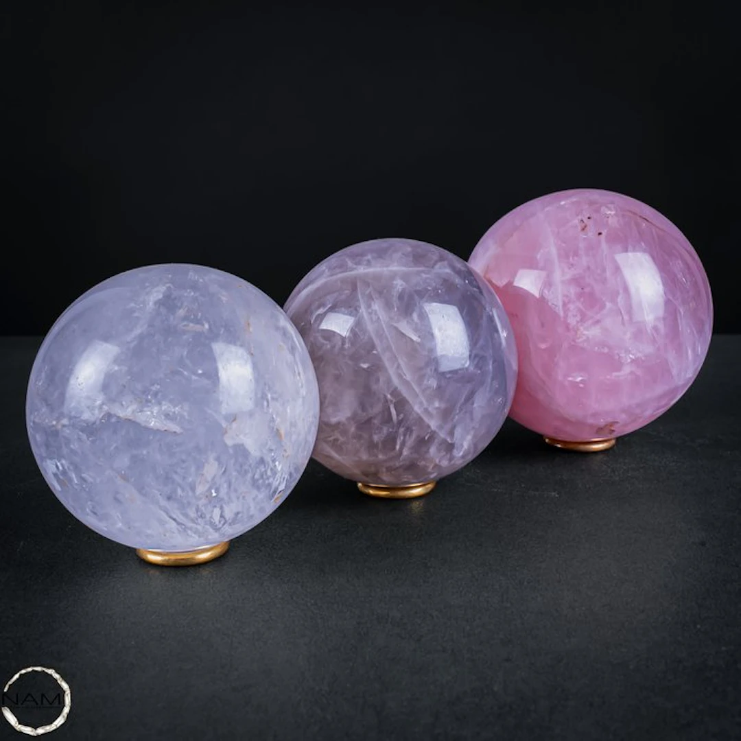 Noble trio of spheres made from rose quartz