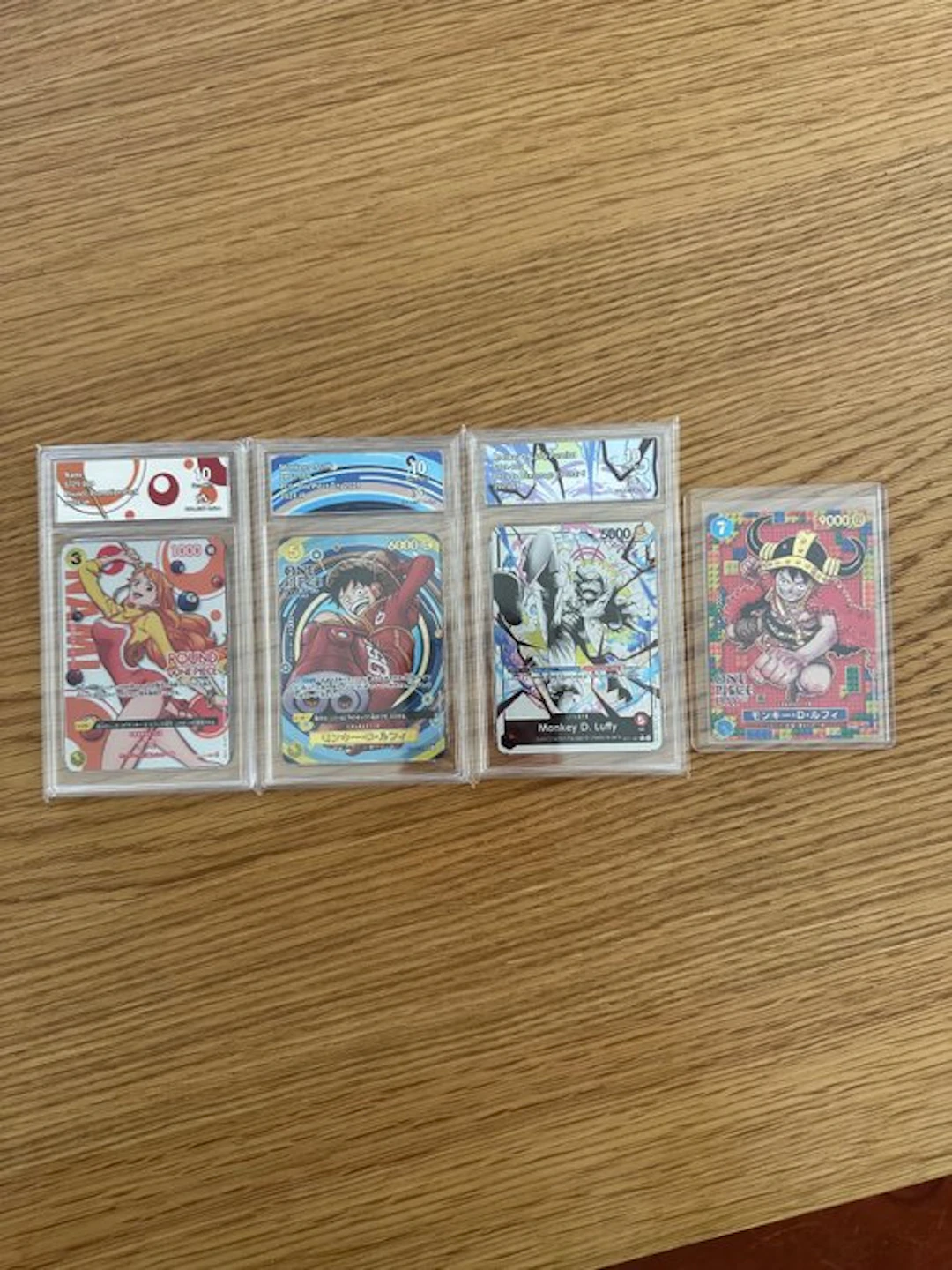 Bandai - 4 Graded card - One Piece - Monkey D
