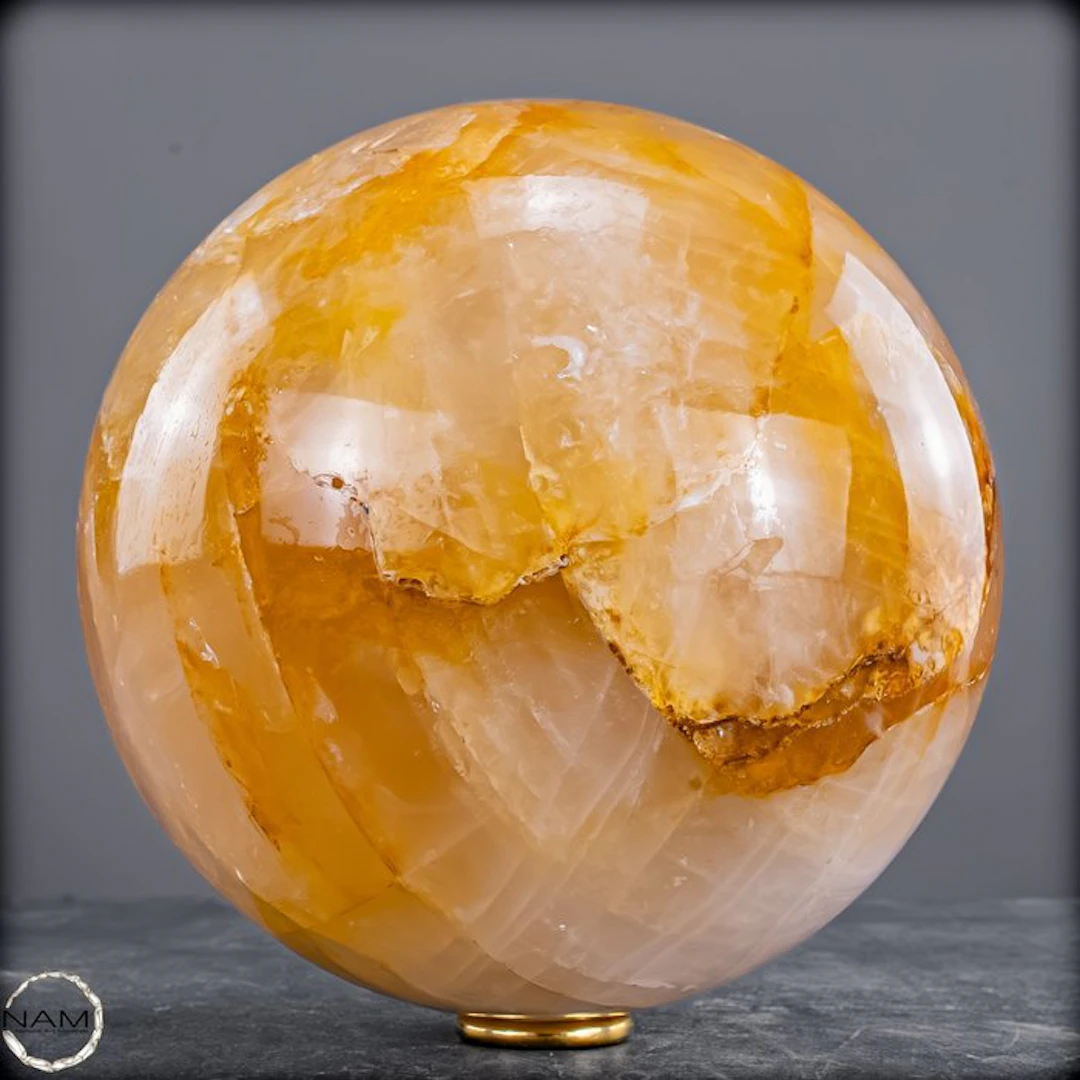 Natural Golden Healer Quartz Sphere – warm light
