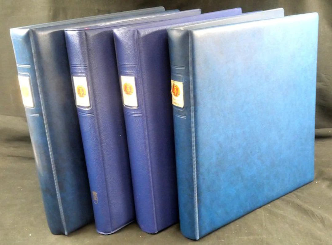 GDR - 4-volume collection of small blocks and composite prints, mint condition.