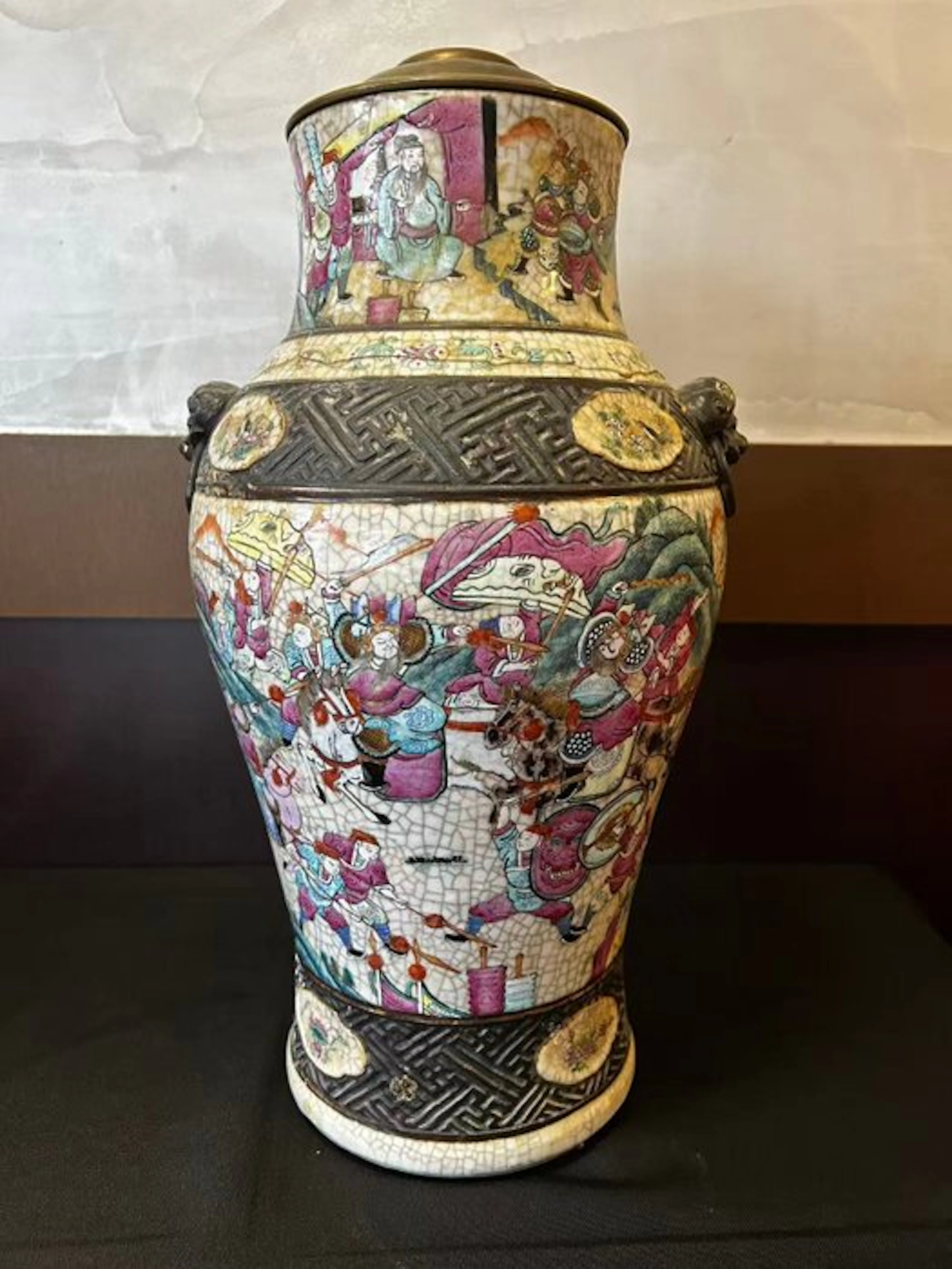 Chinese porcelain vase featuring a scene of figures
