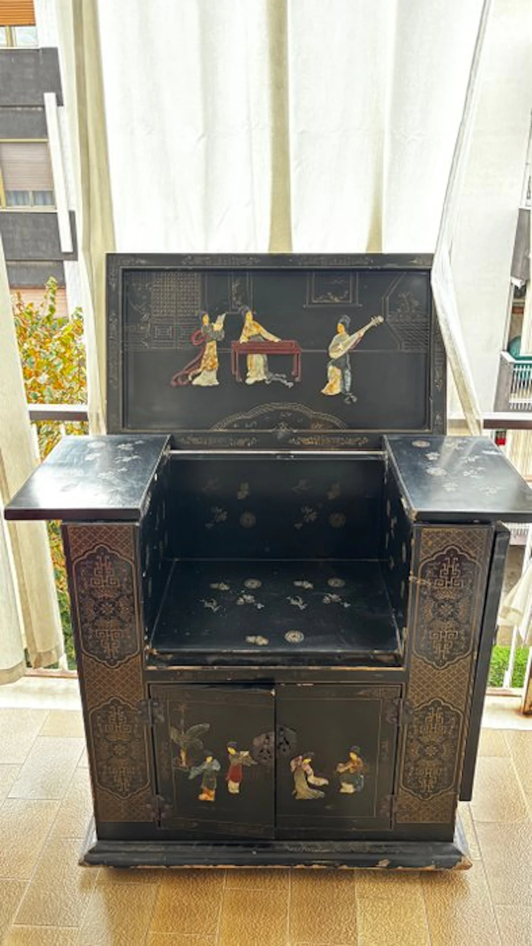Black lacquered sideboard with soapstone inlays from...