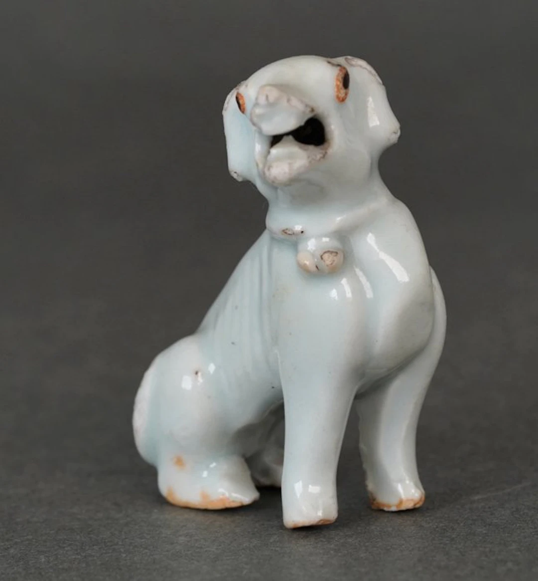 Qingbai Glazed - Seated Hound or Dog With Black Oxide...