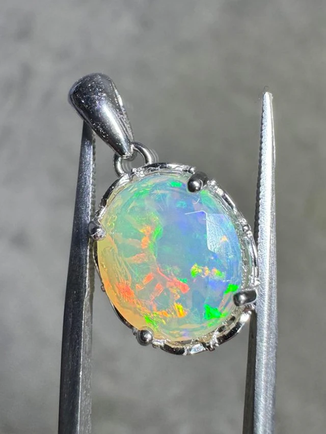 Natural Ethiopian white opal faceted pendant + 925 silver