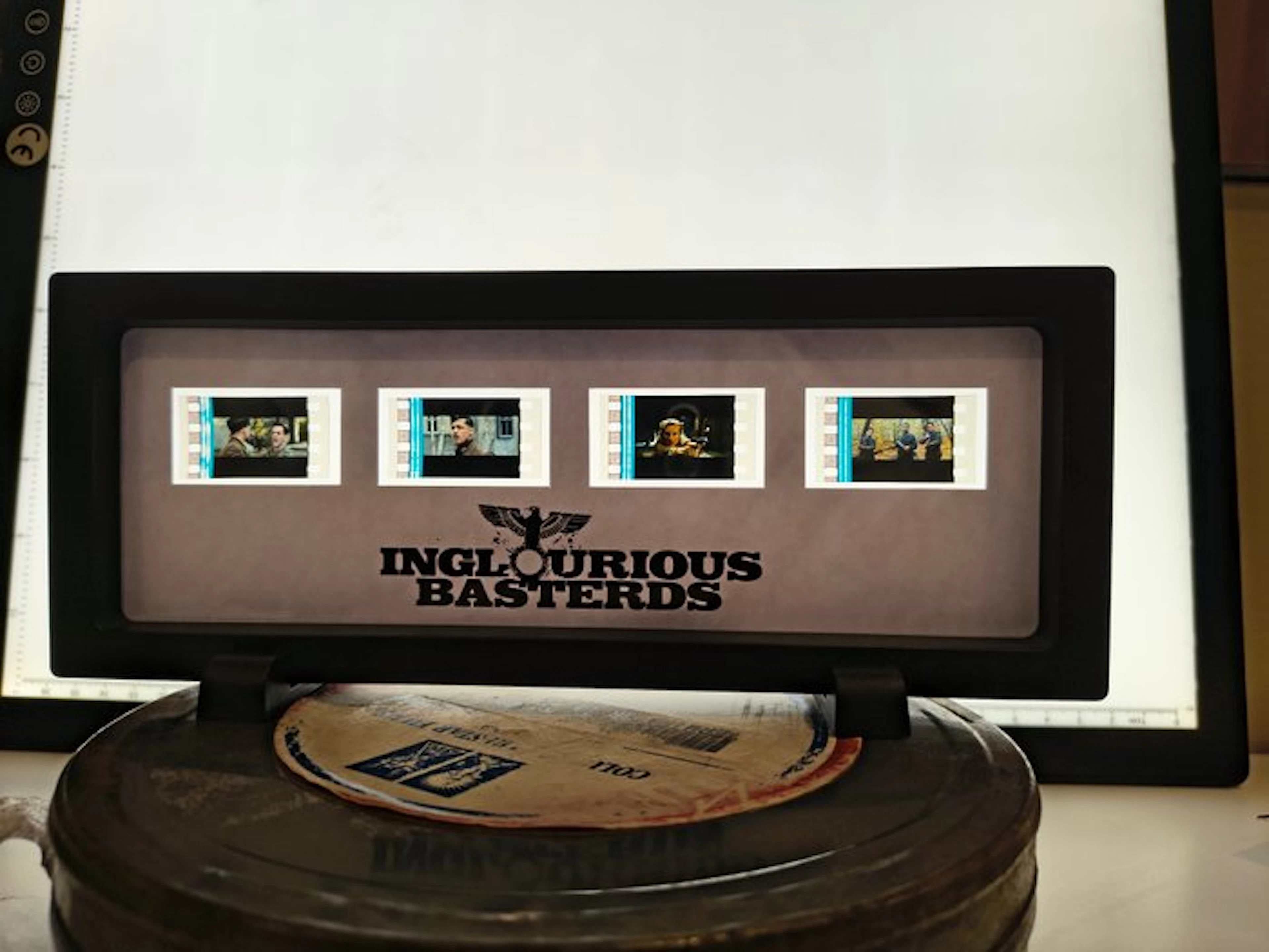 FilmCellsFrame frame with 4 Backlit 35 mm film cells from...