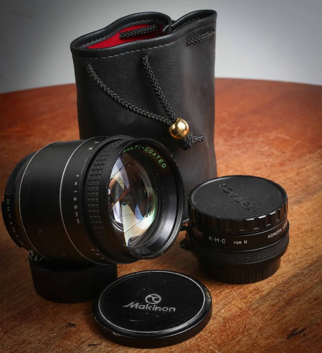 Makinon, Komura 135mm f/2.5 + Doubleur pour Nikon AI Camera lens