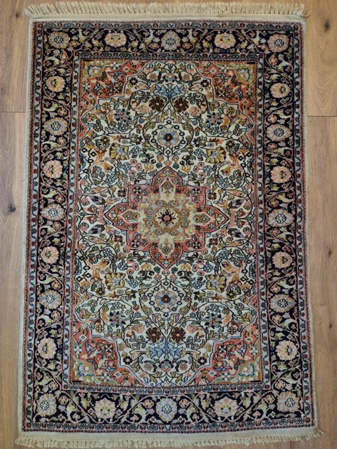 Beautiful antique Oriental rug in Kashmiri medallion style with silk