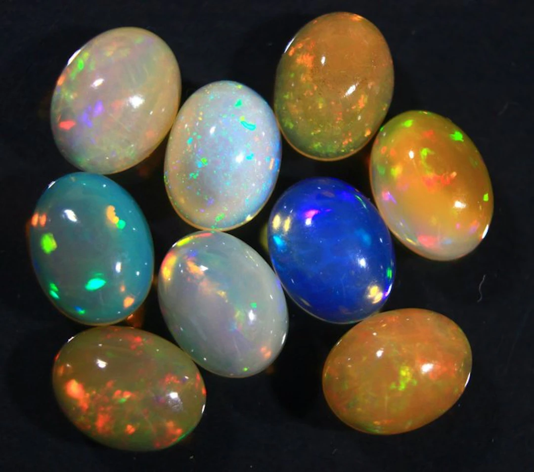 Ct. 10.70 Natural Ethiopian Opals Cabochon - Height: 9 mm - Width: 7 mm- 2.14 g