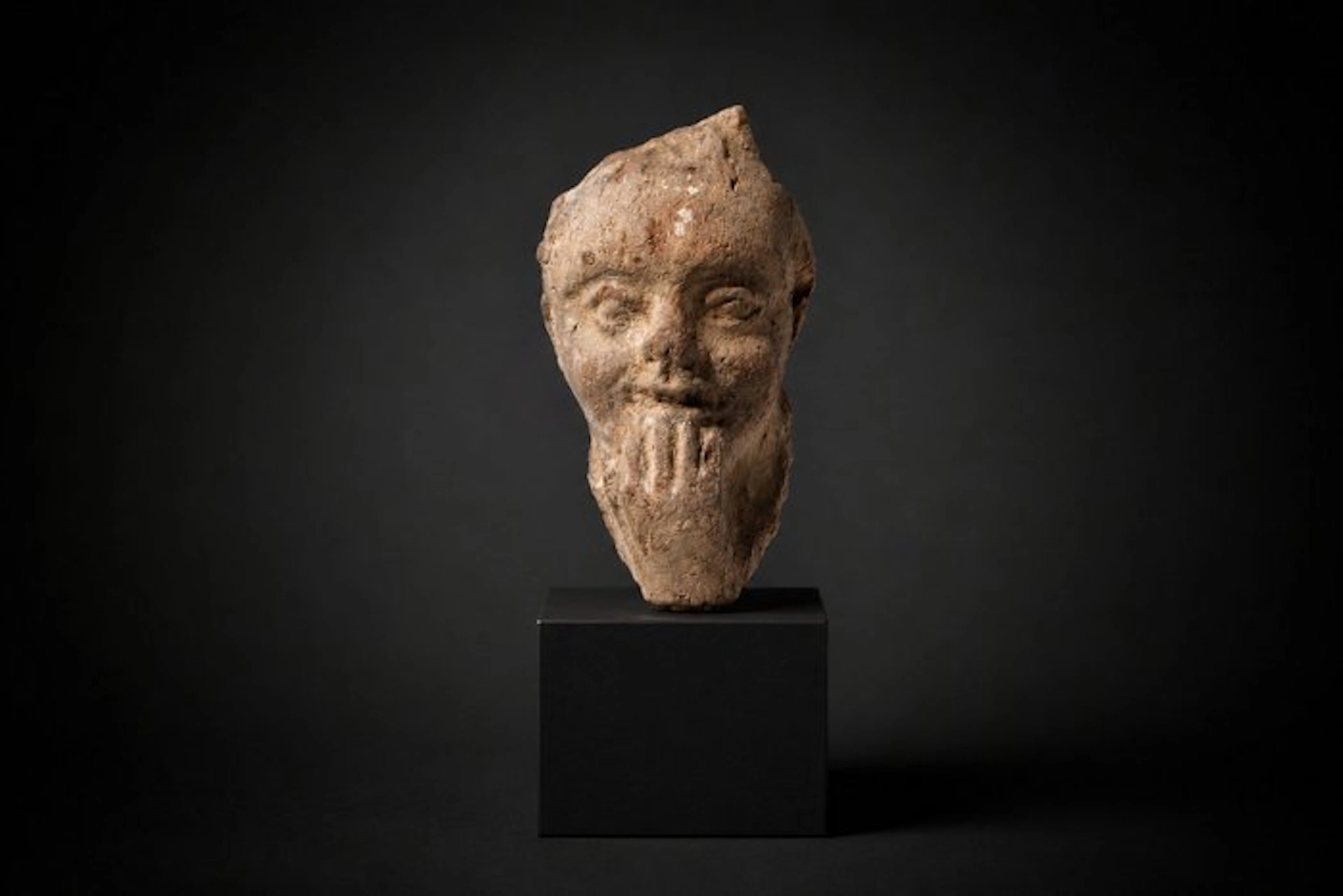 Ancient Greek terracotta head of Harpocrates - 5 cm