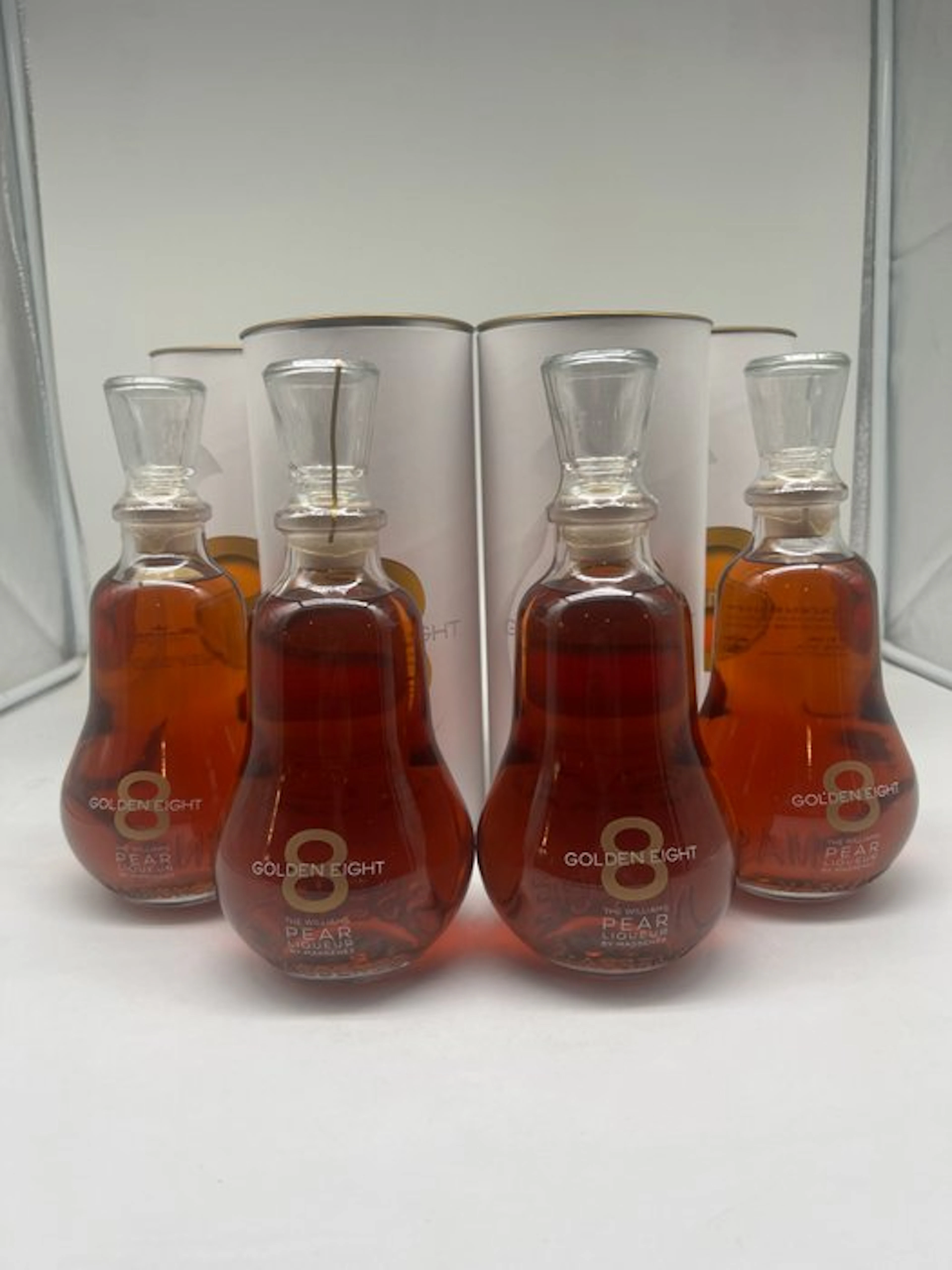 Massenez - Golden Eight - The Williams Pear Liqueur 8yo - 70cl - 4 bottles