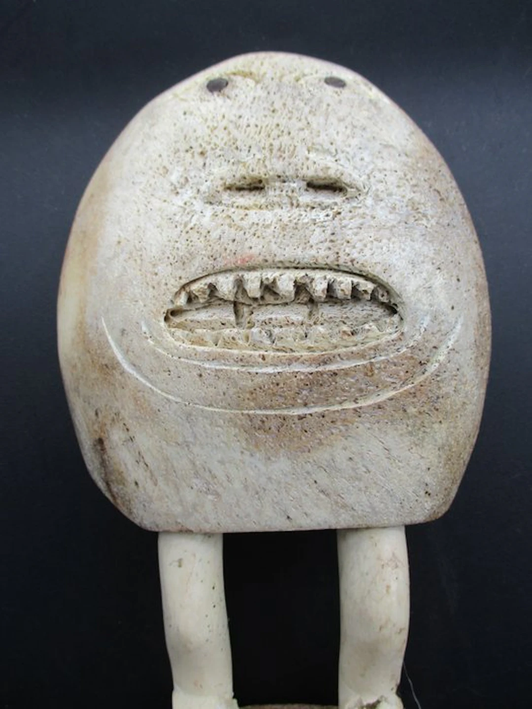 Bone figurine in the Inuit style