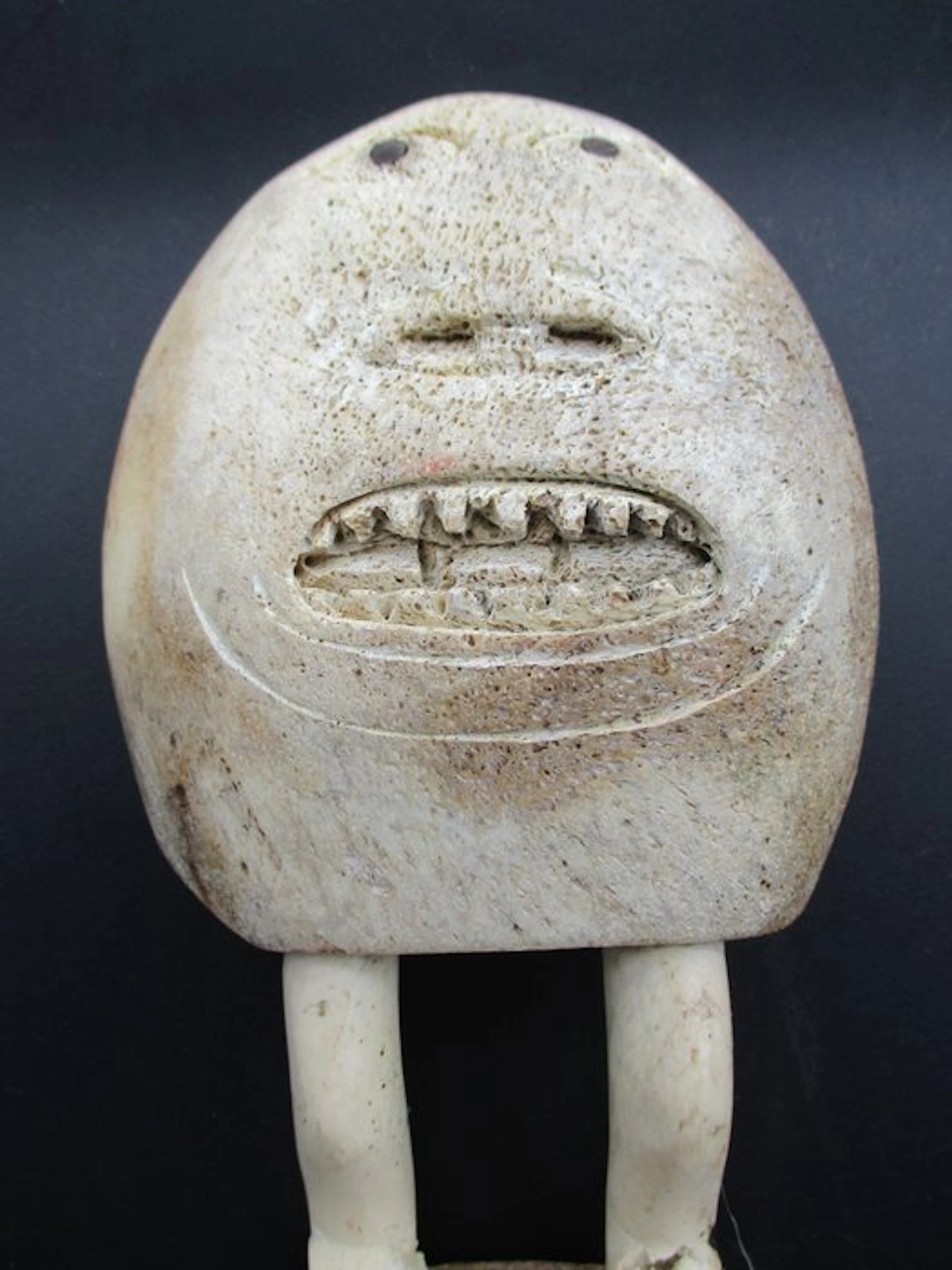 Bone figurine in the Inuit style