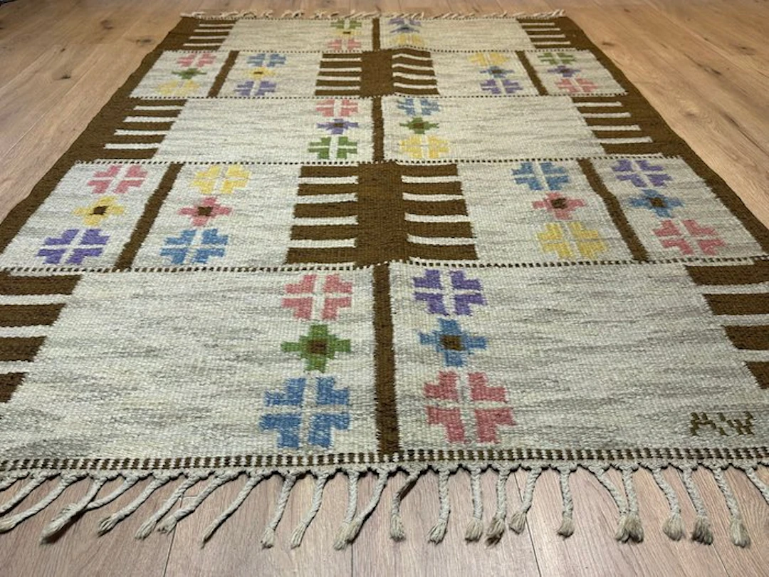 Handwoven Indian Kelim Oriental rug with a traditional...