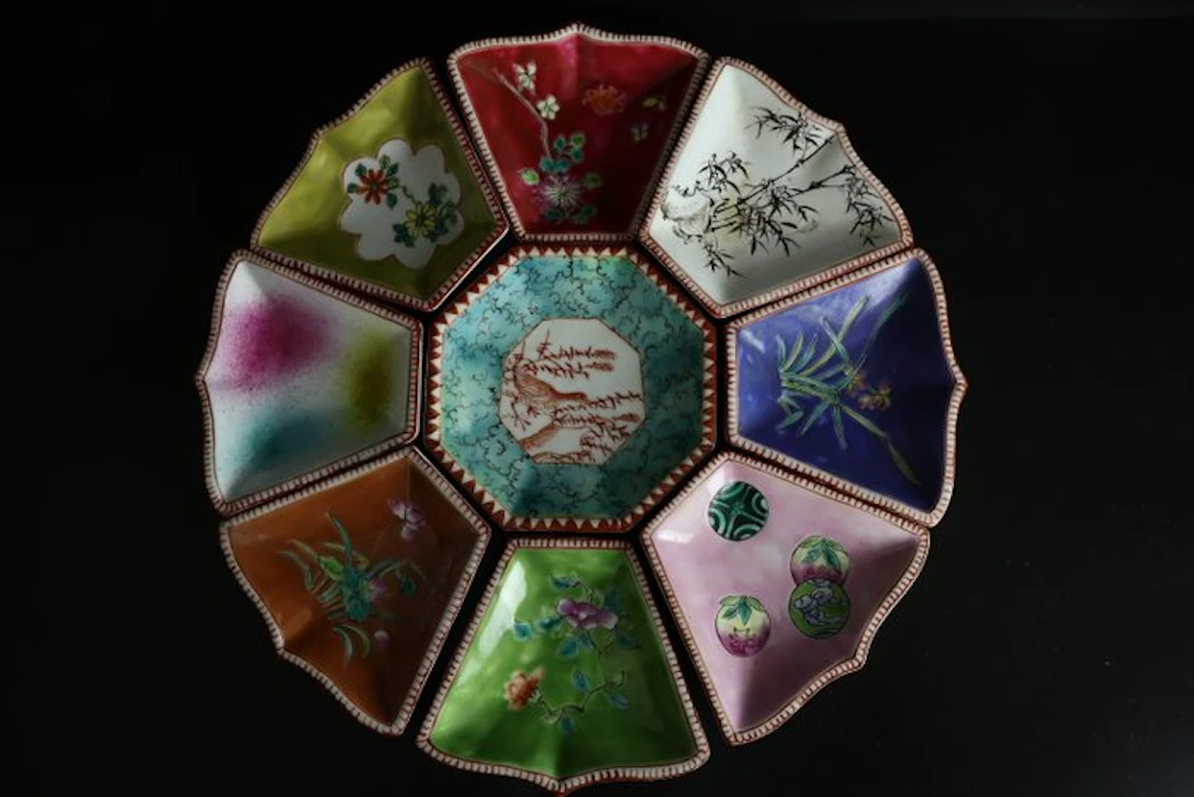 A set of exceptionally rare dipping saucers (known as...