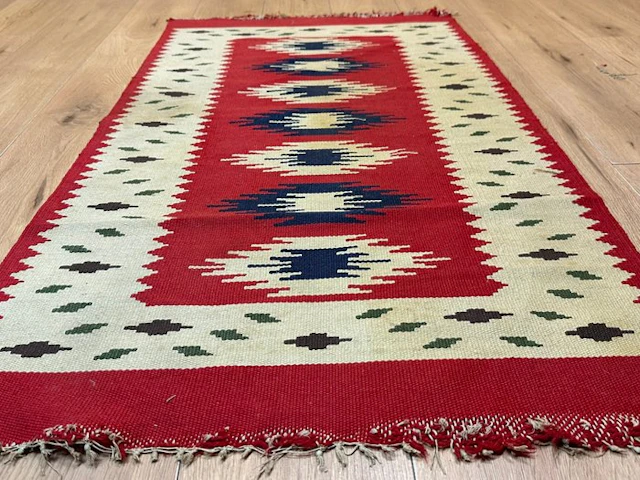 Beautiful Kilim rug with geometric medallions and natural coloring